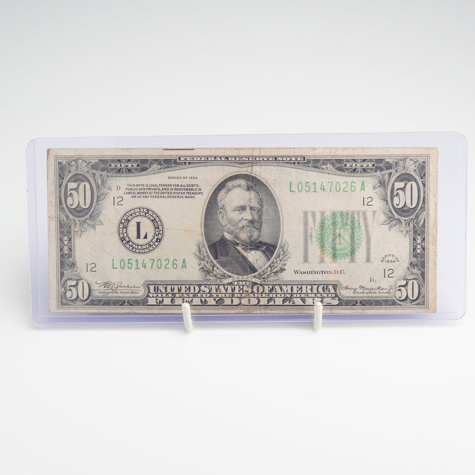 US Series 1934F $50 Federal Reserve Note San Francisco District 12: This vintage US currency bill $ 50.00 is a Series 1934F Federal Reserve Note issued for the Federal Reserve Bank of San Francisco, California. The obverse features a portrait of Ulysses S. Grant in