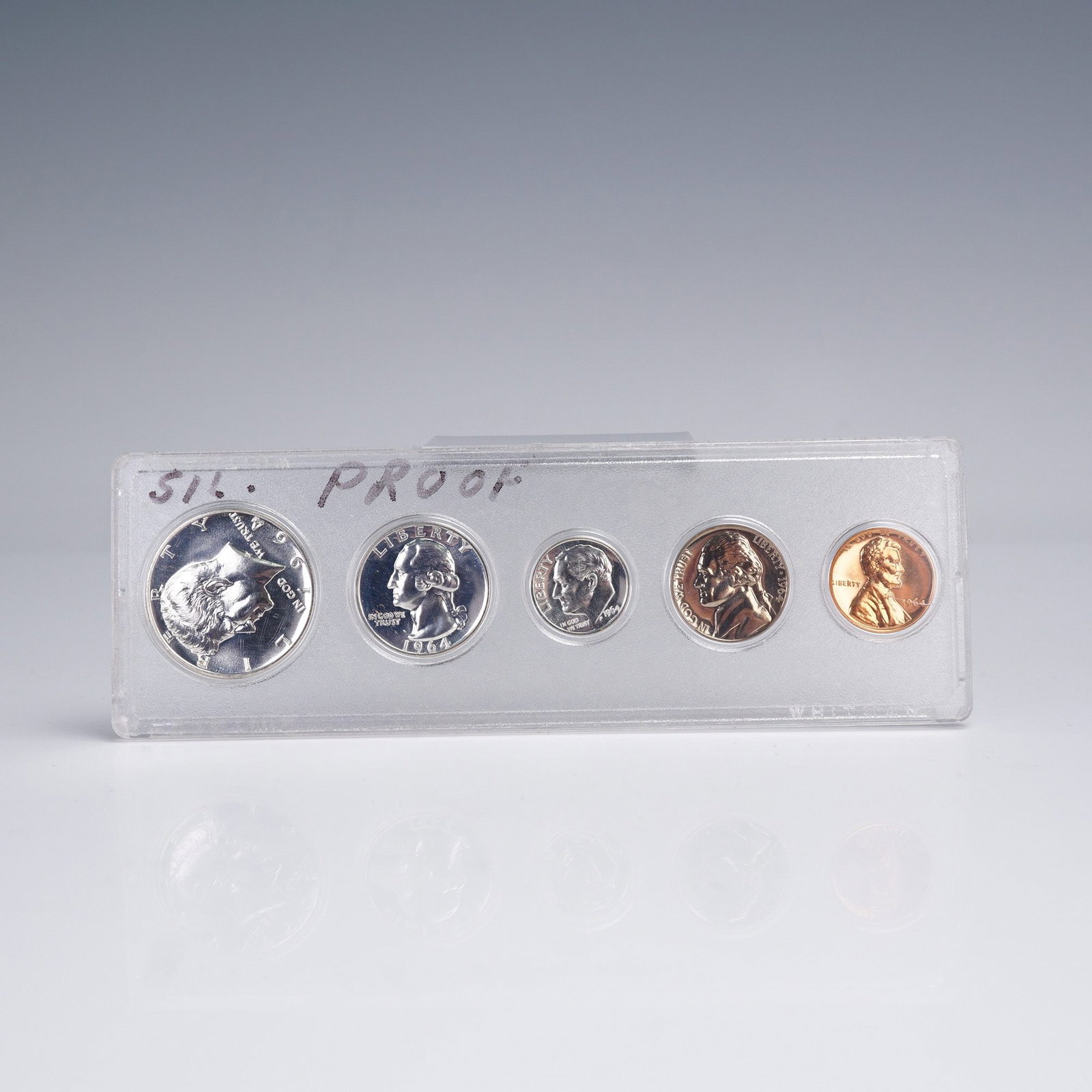 1964 United States 5 Coin Set (Silver Proof): 1964 United States 5-coin silver proof set presented in a clear protective display holder. This final year of the 90% silver composition includes the Kennedy Half Dollar, Washington Quarter,