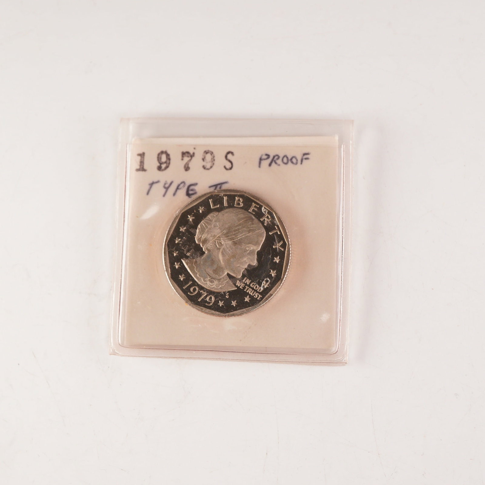 1979-S U.S. Susan B. Anthony One Dollar Proof Coin Type II: One Dollar Proof coin, representing the desirable Type II mintmark variety. Struck at the San Francisco Mint, this proof issue displays the sharper, clearer "S" mintmark characteristic of the Type II