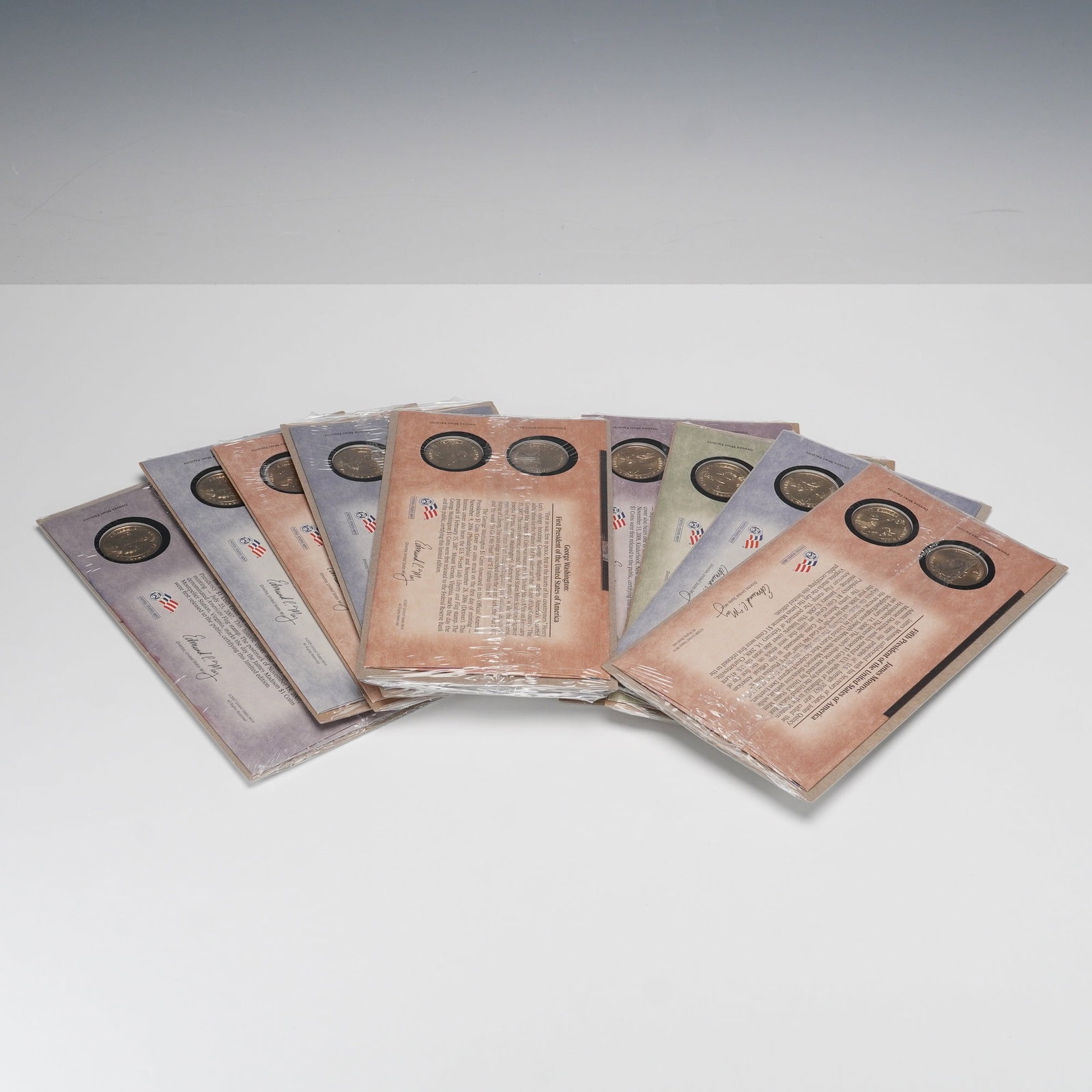 9pc U.S. Mint Presidential $1 First Day Coin Covers: Offered here is a group of nine official U.S. Mint Presidential Dollar Coin Covers. Each sealed envelope-style cover features two $1 coins, one from the Philadelphia Mint and one from the Denver Mint,