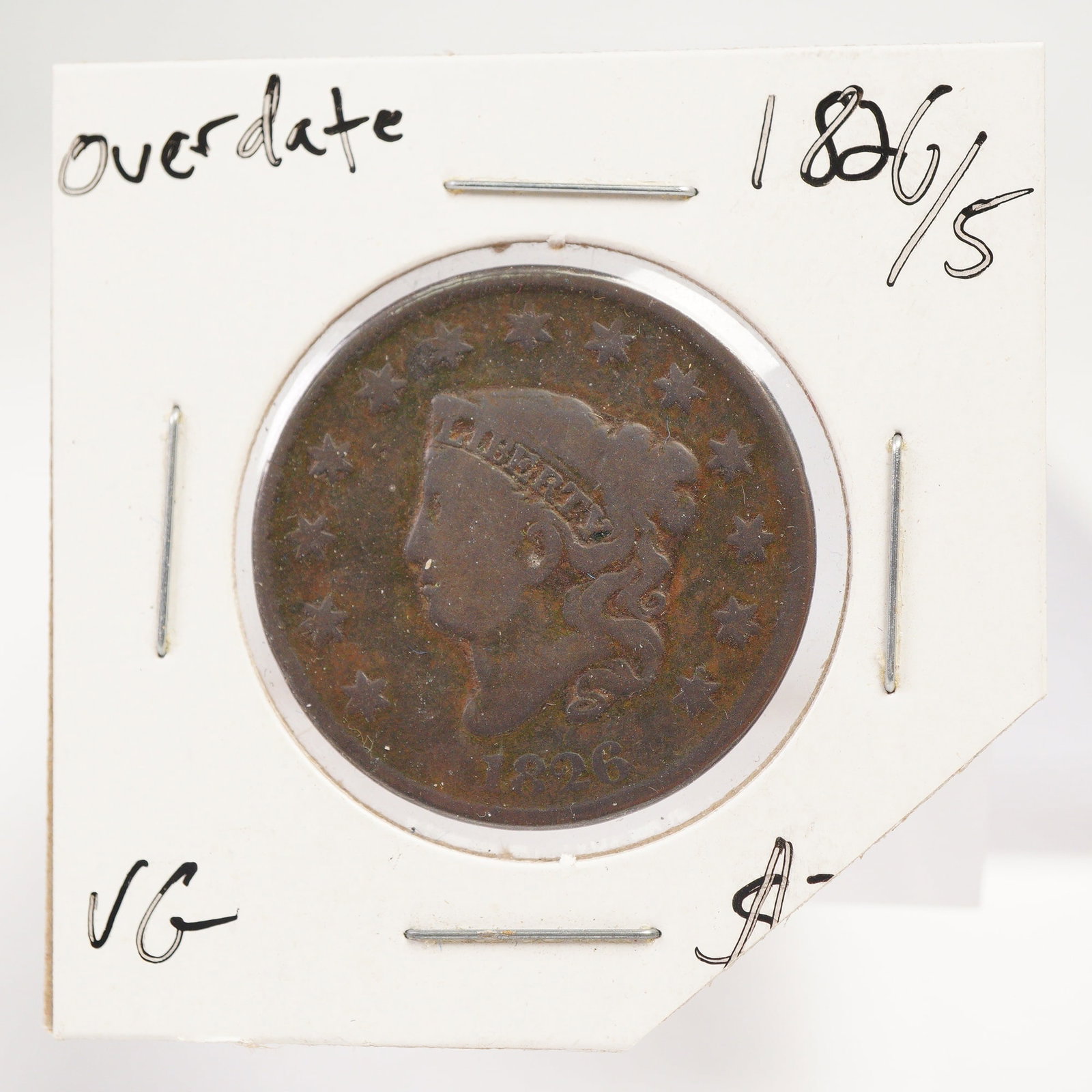 1826/5 Overdate Coronet Head Large One Cent Coin: An early United States copper cent dated 1826 exhibits the Coronet Head design with Liberty in left-facing profile encircled by thirteen stars. The date displays the recognizable 1826/5 overdate featu