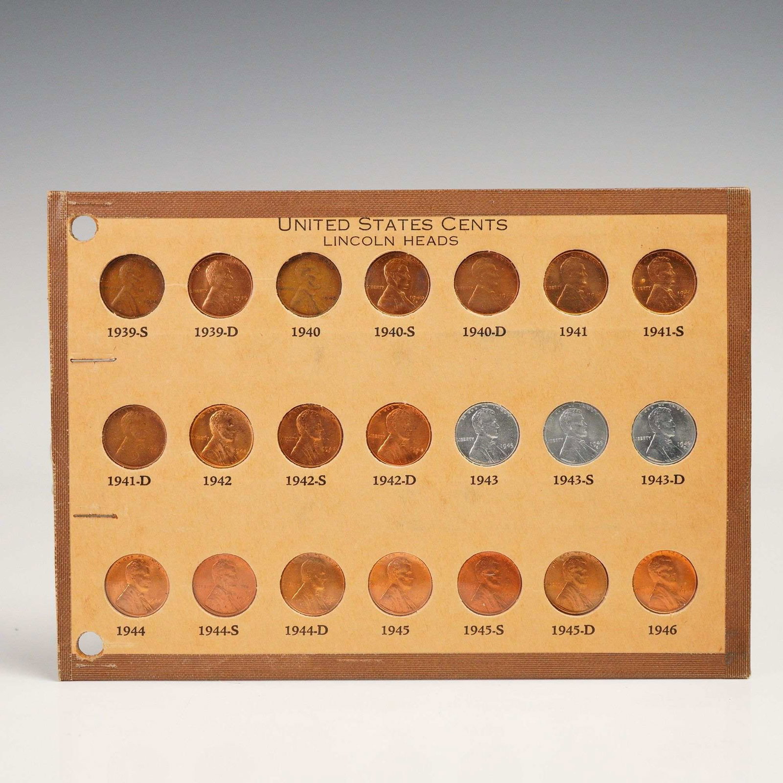 1939 - 1946 U.S. Lincoln One Cent Head Coins: Assembled collection features United States Lincoln Cents dated 1939 through 1946, mounted in a vintage Whitman-style album page. The set includes mints from Philadelphia, Denver, and San Francisco, w