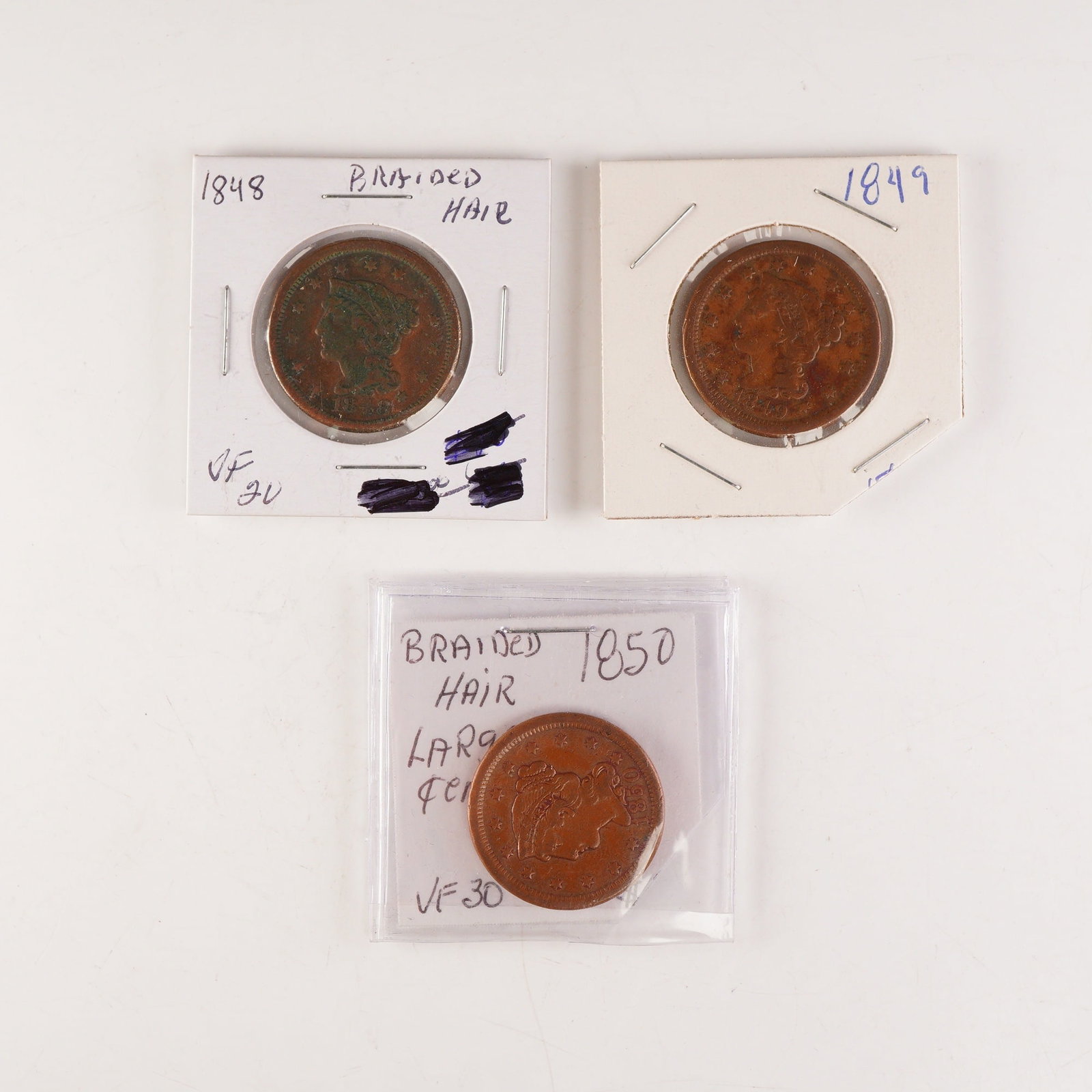 3pc 1848 - 1850 U.S. Braided Hair Large One Cent Coins: United States Braided Hair Large Cents dated 1848, 1849, and 1850, each struck in copper and representing mid-19th-century large cent production prior to the denomination's discontinuation in 1857.