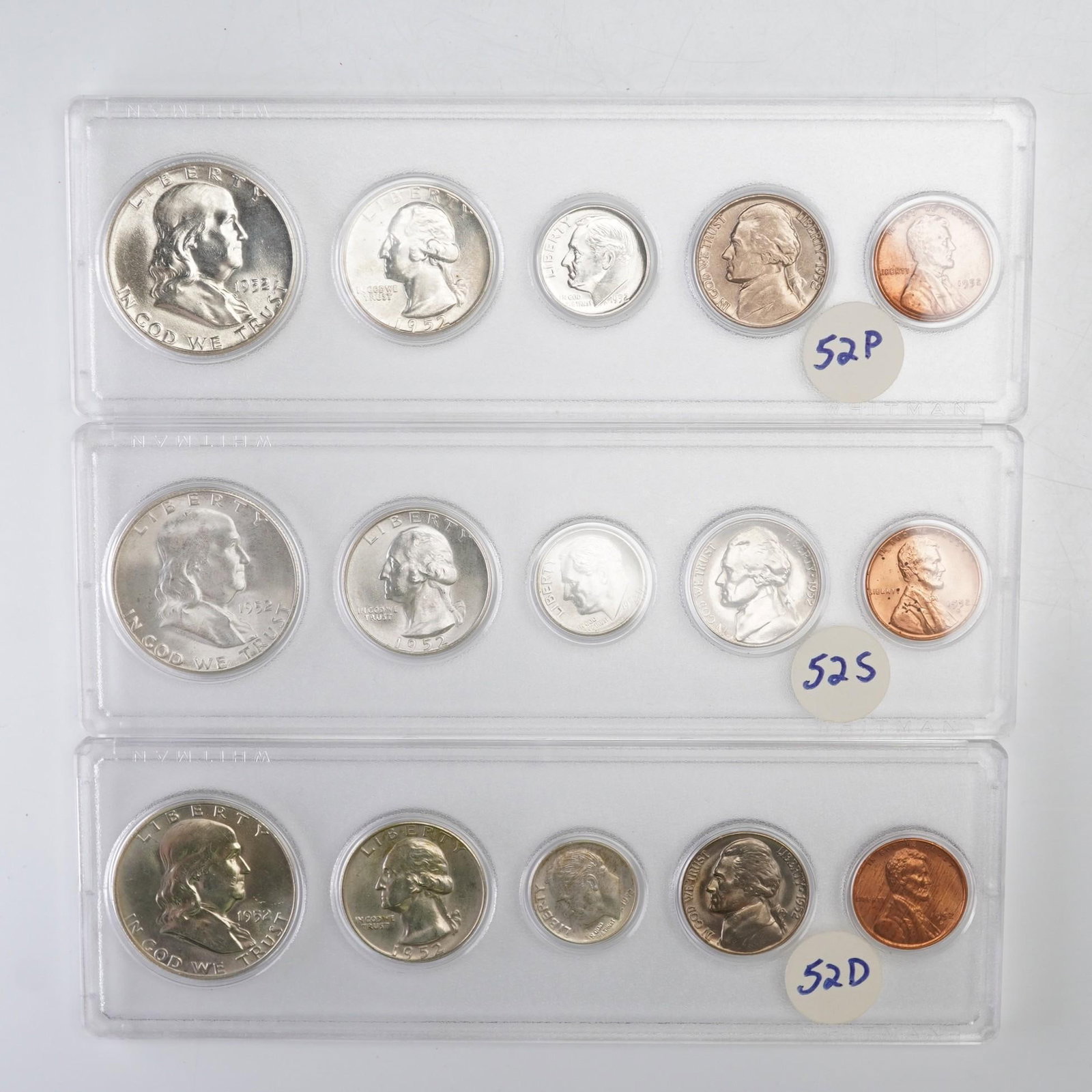 3pc 1952 United States Coin Sets: Each holder includes the Lincoln Cent, Jefferson Nickel, Roosevelt Dime, Washington Quarter, and Franklin Half Dollar. The coins are enclosed in a Whitman slab. Dimensions: Slabs: 6"W x 2"H Date or Er