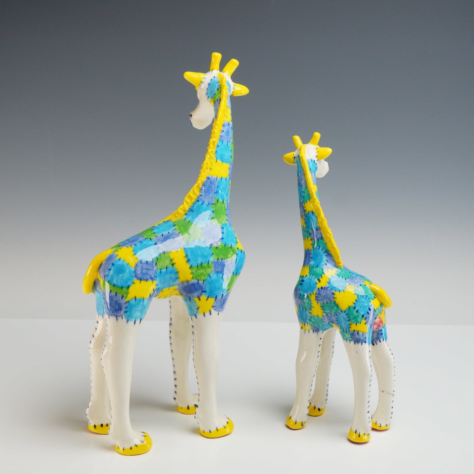 2pc M. Southwell Patchwork Ceramic Giraffe Figurines - 2