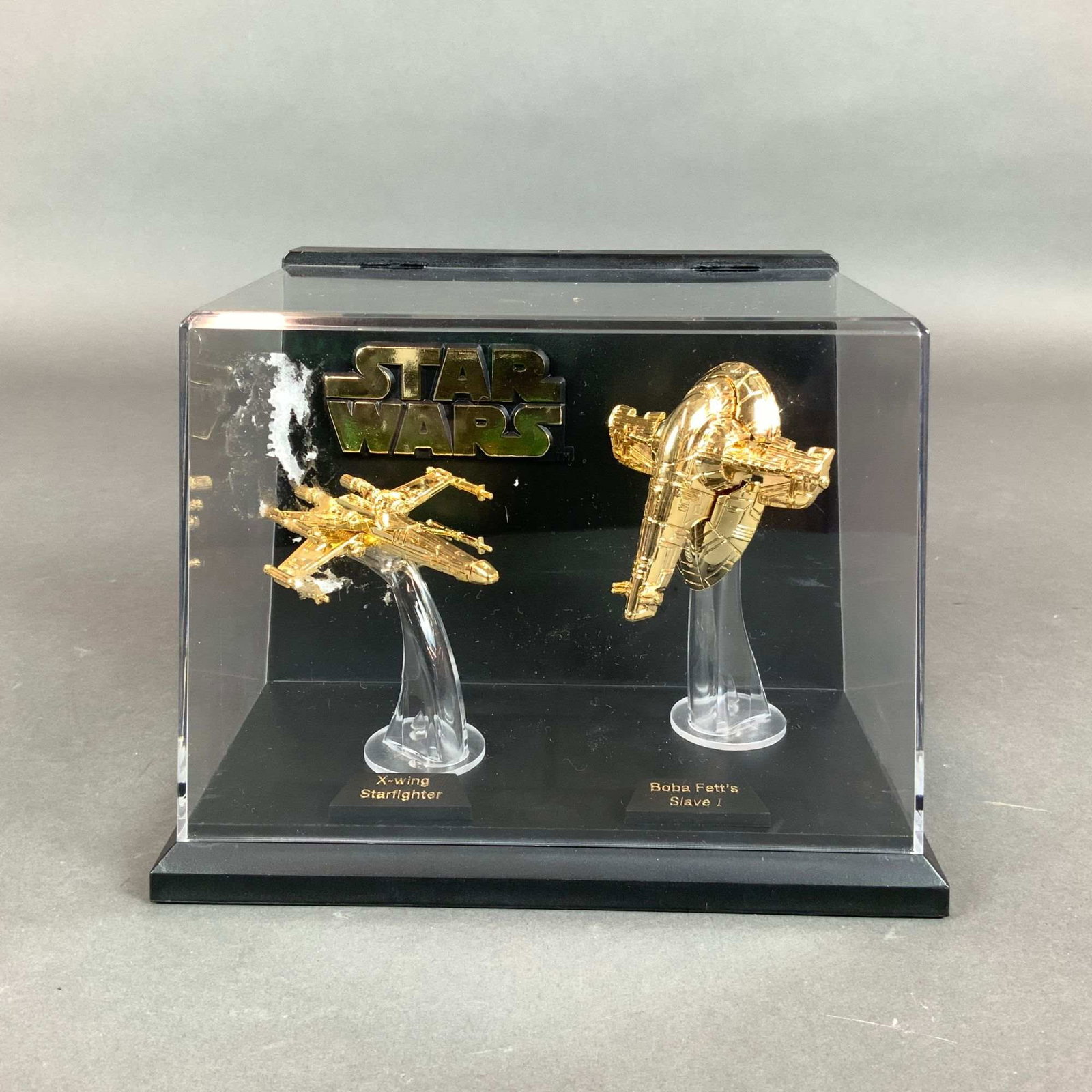 Package of Two Star Wars Miniature Starships in Display Case: A collectible starship display produced by Lewis Galoob Toys, Inc. (L.G.T.I.) in 1996 under license from Lucasfilm Ltd. (L.F.L.). This set, identified as part of the Micro Machines Star Wars Classic S