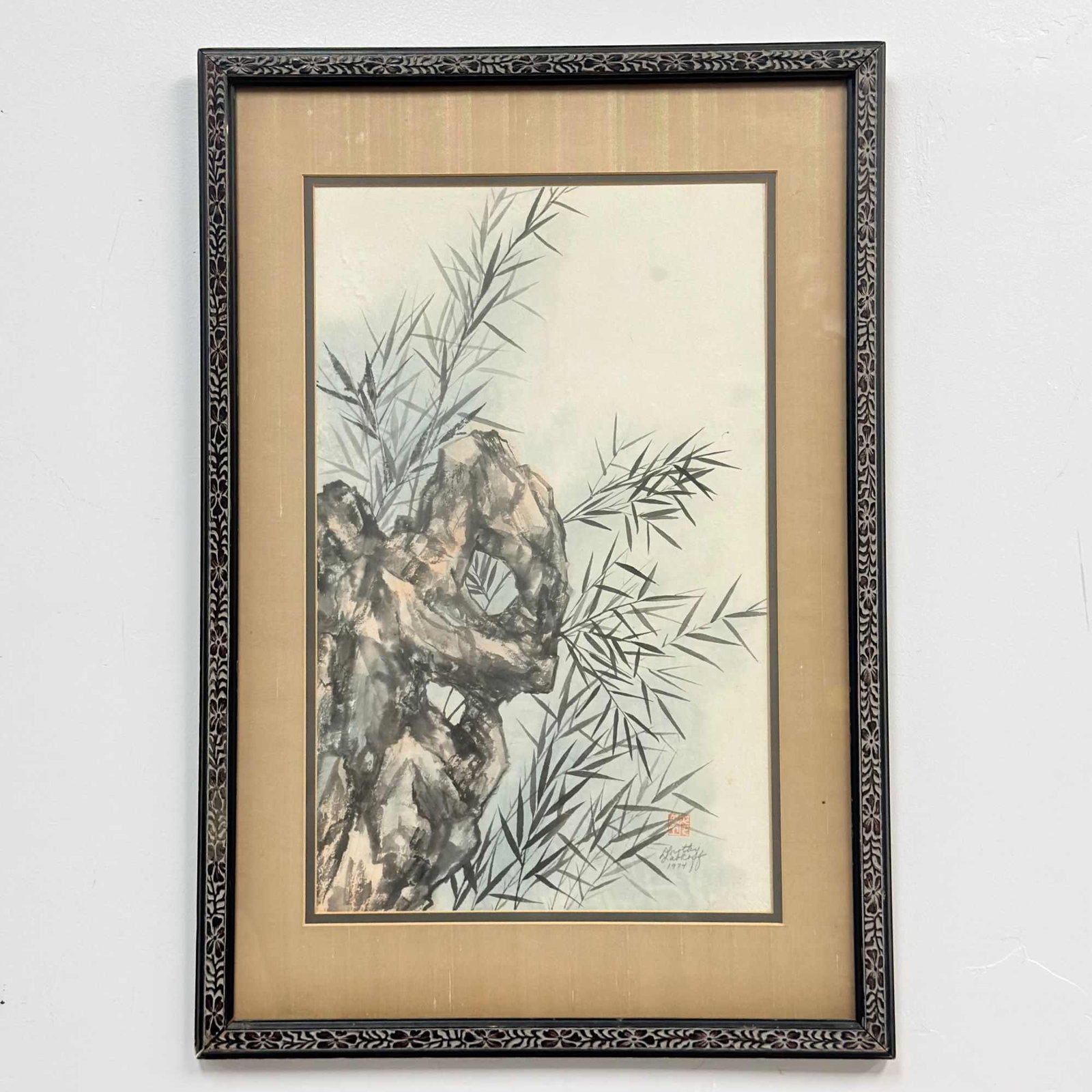 Dorothy Labkoff, Framed Chinese Brush Painting of Bamboo and Scholar's Rock, 1974: This framed Chinese brush painting by artist Dorothy Labkoff is executed in ink wash and watercolor on paper. The composition depicts a traditional subject of a craggy scholar's rock, or Taihu stone, 