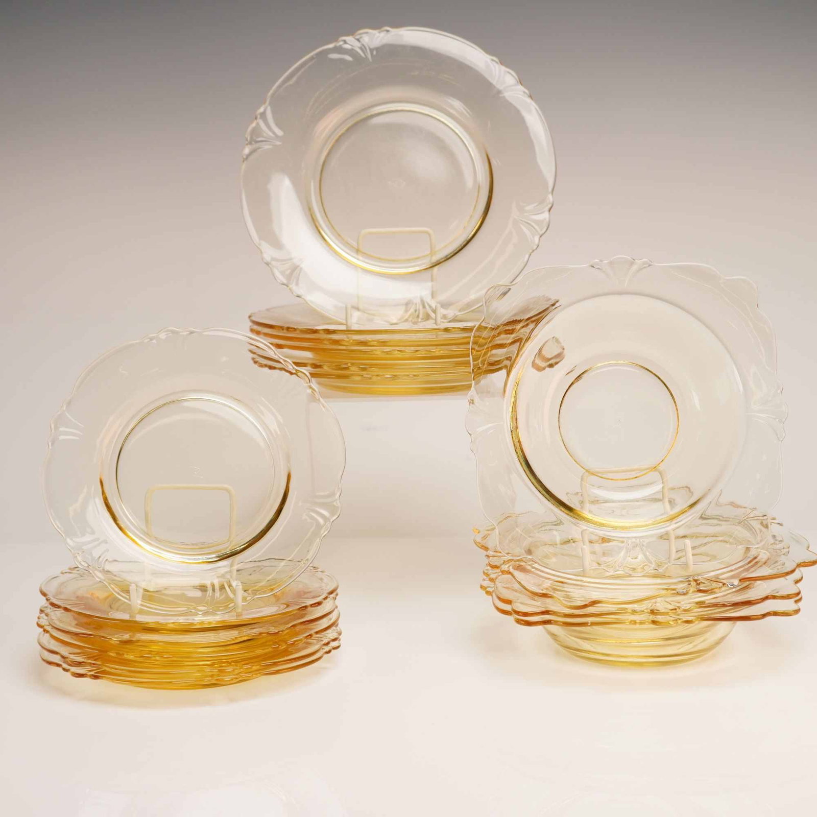 16pc Heisey Empress Pattern Glassware in Sahara Yellow: This is a set of 16 pieces of translucent yellow glassware produced by the A.H. Heisey and Company of Newark, Ohio. The collection is in the Empress pattern, also known as Pattern No. 1401, which