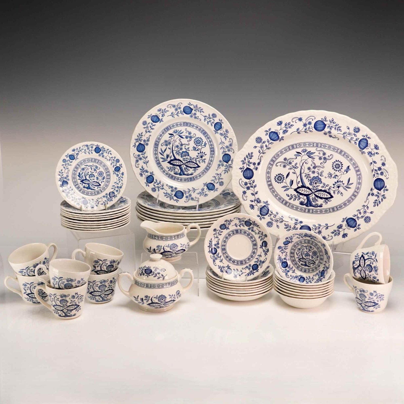 45pc Enoch Wedgwood Tunstall Lunch Set for 8, Blue Heritage: This 45 piece lunch set for 8 was manufactured in England by Enoch Wedgwood (Tunstall) Ltd. in the Blue Heritage pattern. The service is crafted from earthenware and features underglaze