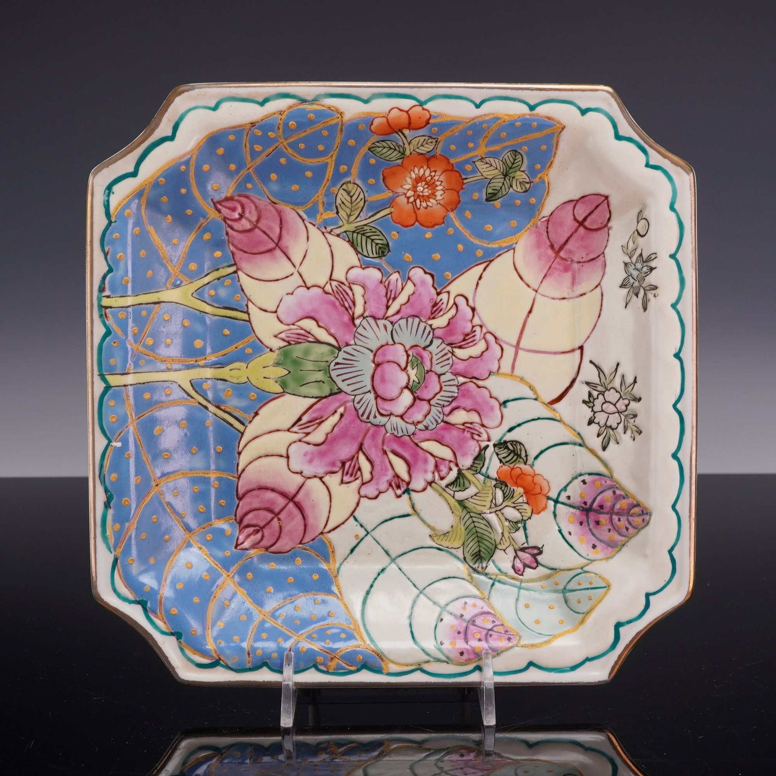 Andrea by Sadek Hand Painted Porcelain Decorative Square Plate: This is a square porcelain decorative plate produced for the importer Andrea by Sadek, featuring the Tobacco Leaf pattern. The plate is constructed with notched corners and a shallow well. The decorat