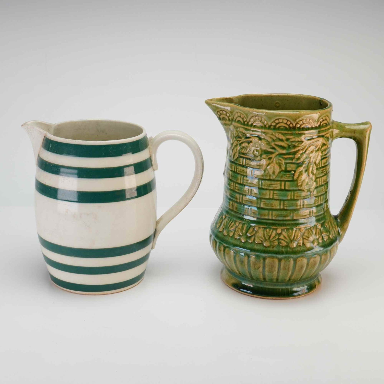 2pc Avon Earthenware Striped Pitcher Along with Green Victorian Majolica Pitcher (1 of 4)