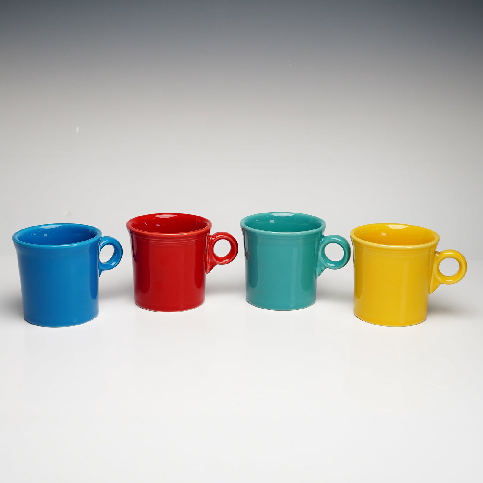 Set of Four Homer Laughlin Fiesta Multicolor Coffee Mugs w/ Ring Handles (1 of 3)