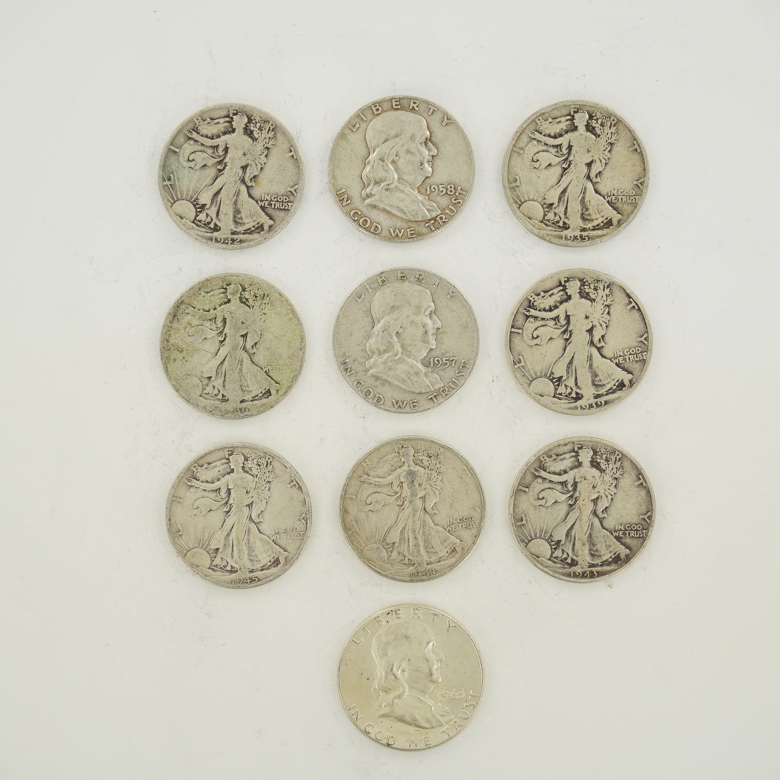 A Collection of US Walking Liberty and Franklin Silver Half Dollars (1 of 2)