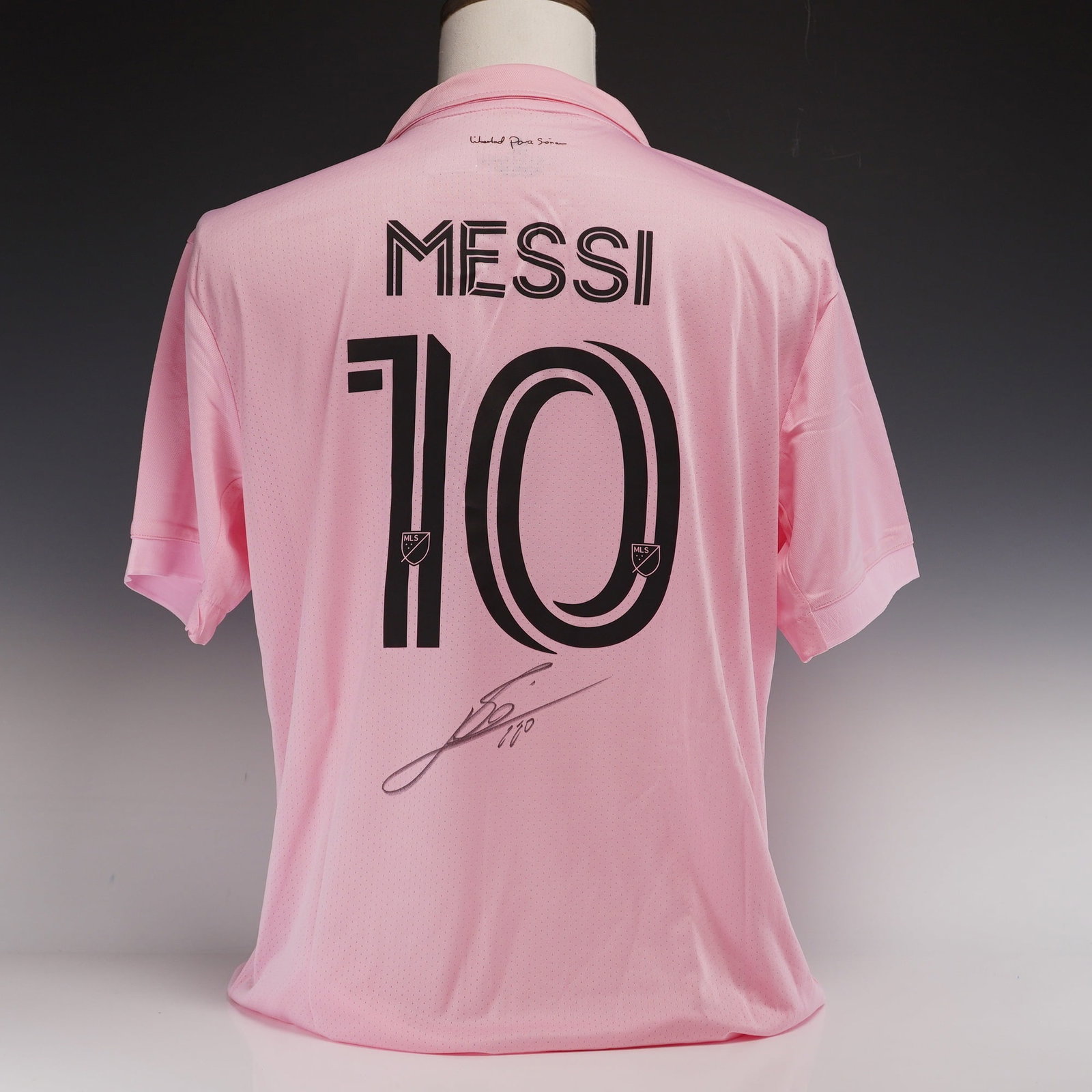 Lionel Messi Signed Inter Miami CF 2022-23 Home Jersey with Icons.com COA: This is an official Adidas Inter Miami CF 2022-23 home shirt, known as "The Heartbeat Kit," featuring the team's signature pink color and black accents. The jersey displays the heat-pressed Inter