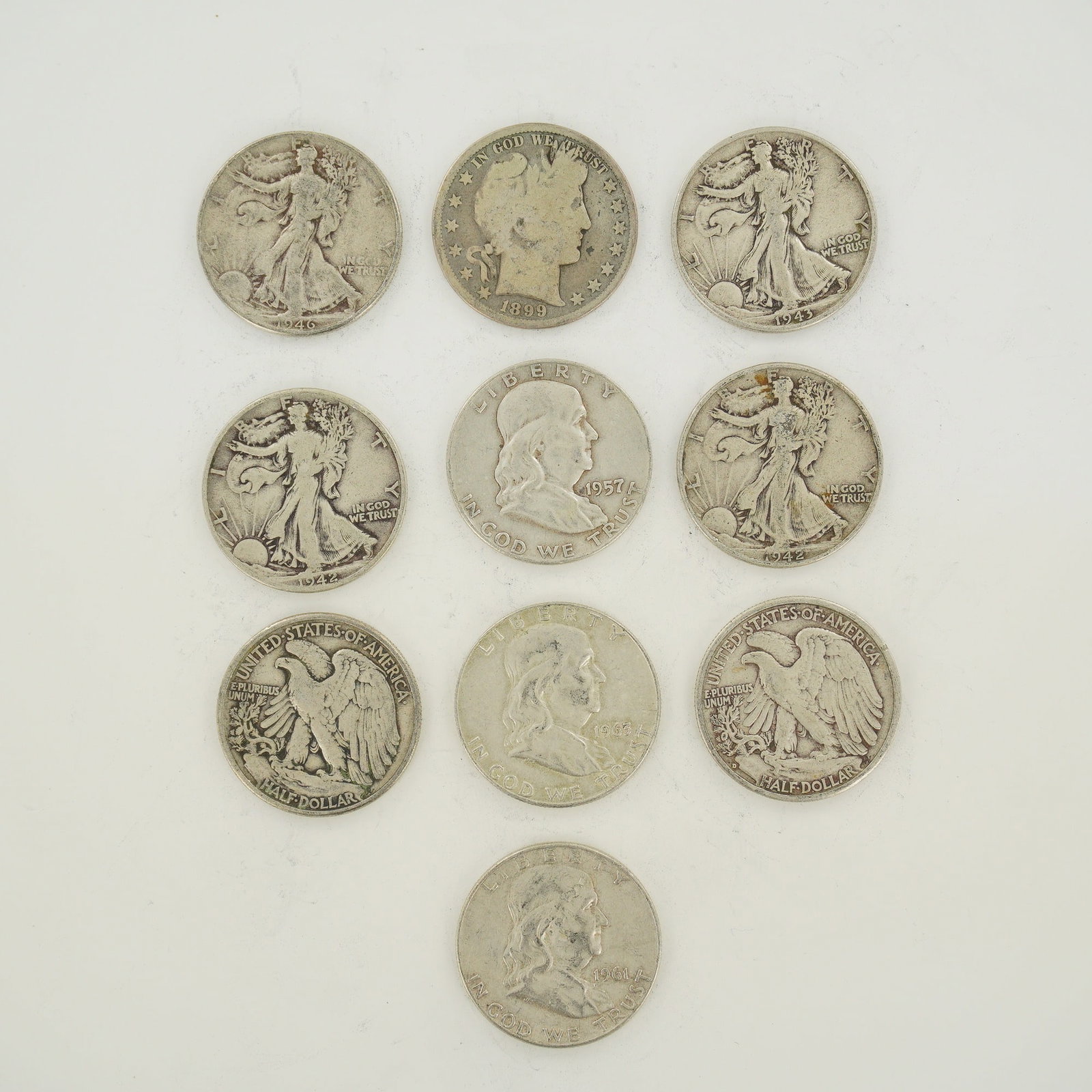 A Collection of Ten US 90% Silver Half Dollars, 1899-1963 (1 of 2)