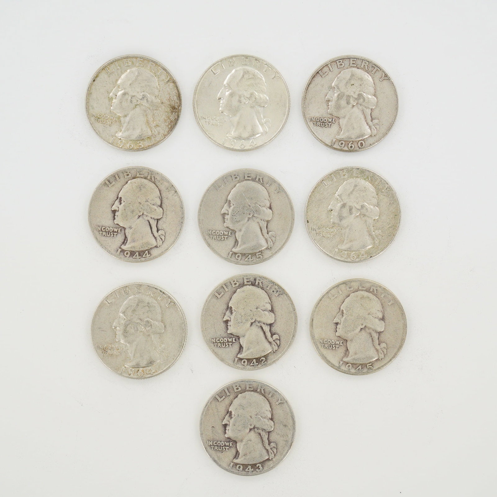 10pc Pre-1964 U.S. 90% Silver Washington Quarters: A collection of US Washington quarter dollars composed of 90% silver and 10% copper, cataloged as KM# 164. This mixed date bag of coins includes specimens from the Philadelphia, Denver (D), and San Fr