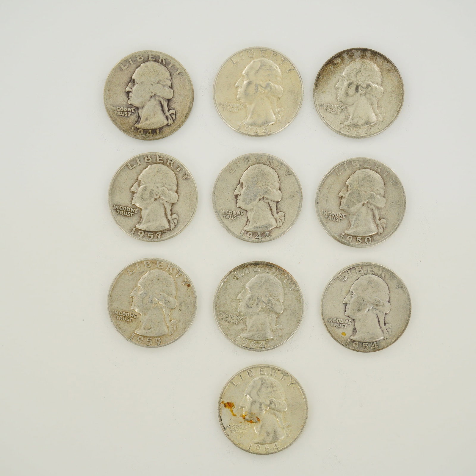10pc Pre-1964 U.S. 90% Silver Washington Quarters: A collection of ten US Washington Quarter Dollars struck in 90% silver. The group includes the following dates and mint marks: 1941, 1942-D, 1950-D, 1954-D, 1957-D, 1959-D, and four 1964 issues