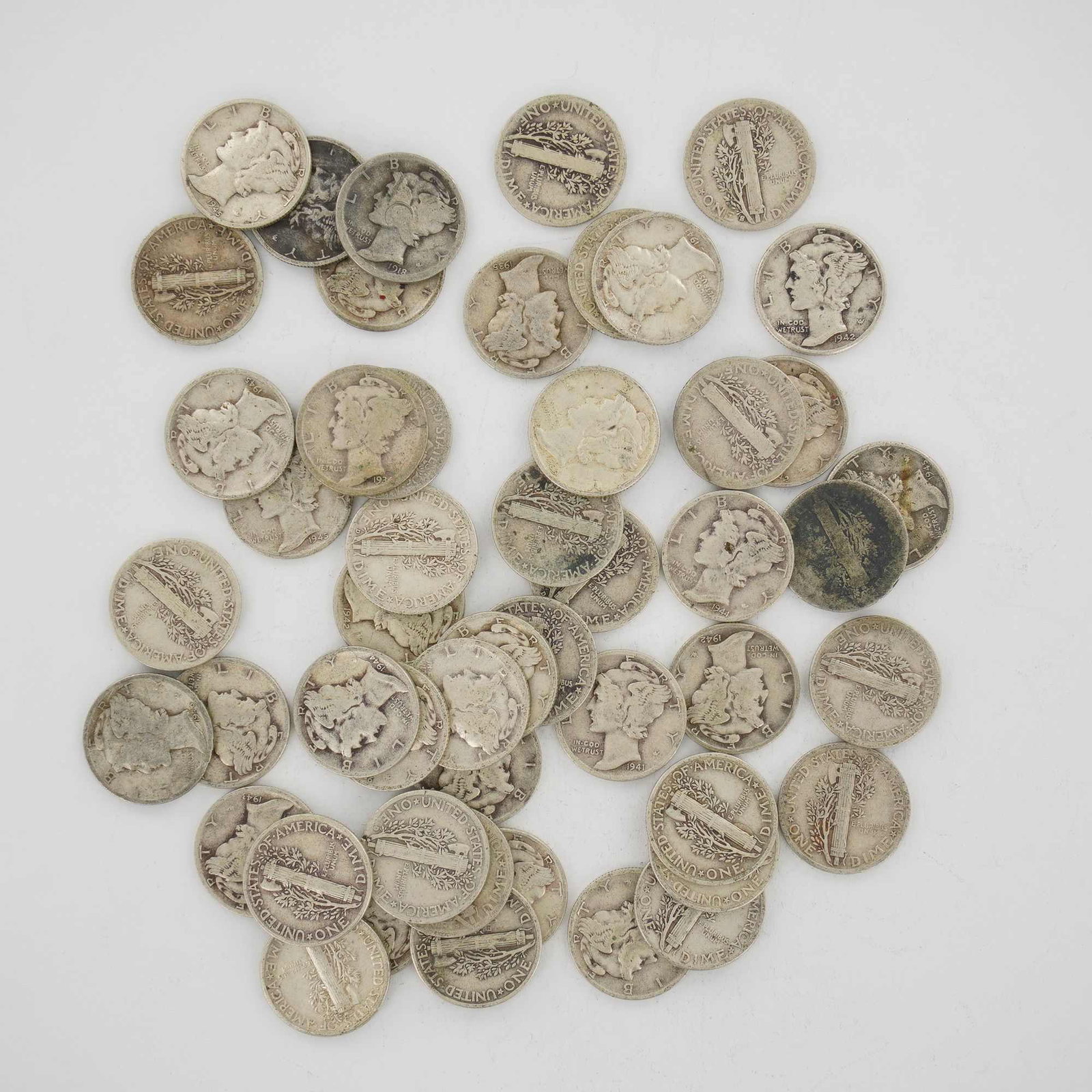 50pc Pre-1945 U.S. 90% Silver Mercury Dimes: This is a collection of US Winged Liberty Head silver dimes, commonly known as Mercury dimes, presented as a mixed date bag of 90% silver coinage. The assortment includes various dates such as 1918, 1