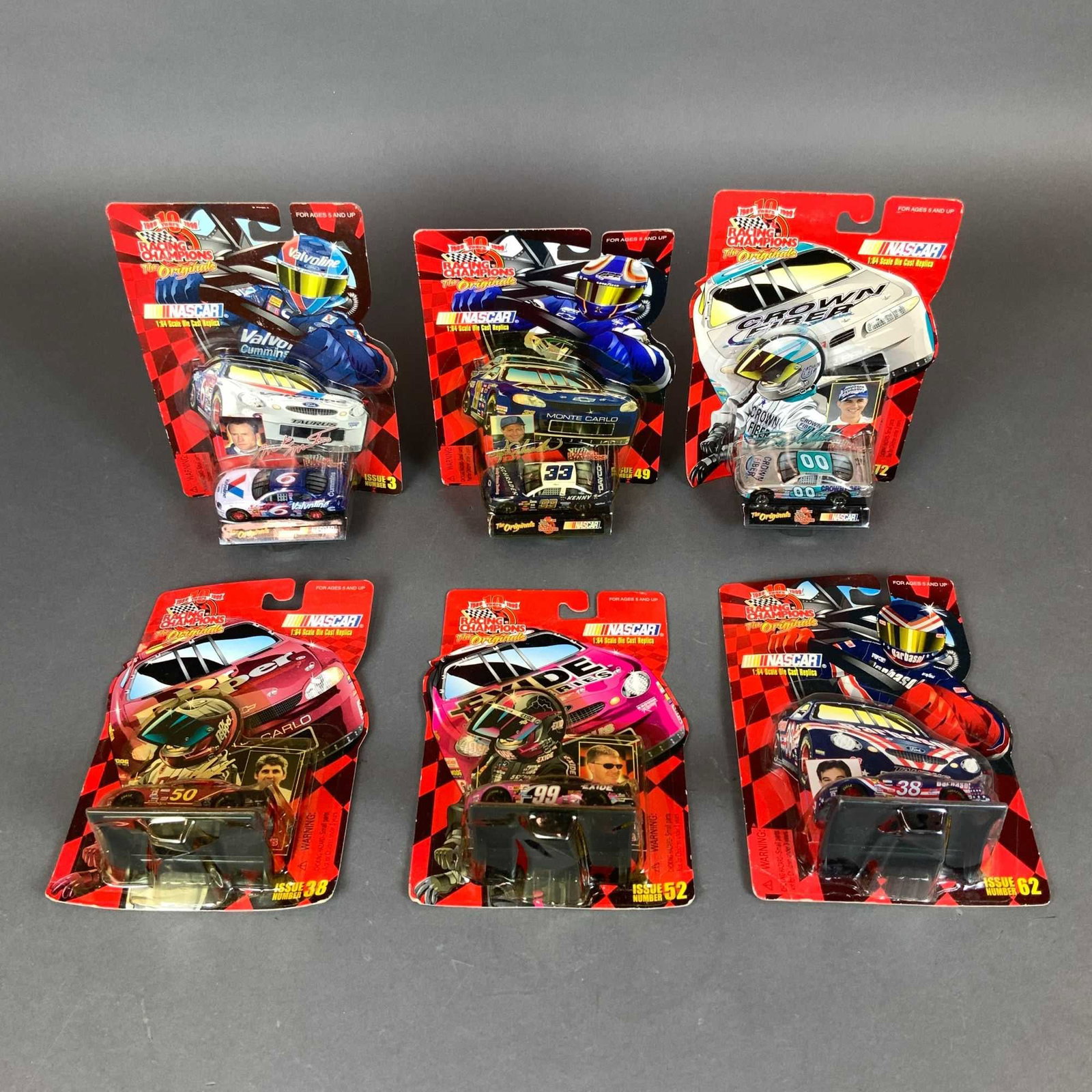 Six Racing Champions NASCAR The Originals 10th Anniversary 1:64 Scale Die-Cast Model Cars: A set of six Racing Champions The Originals 10th Anniversary series 1:64 scale die-cast NASCAR model cars, produced circa 1999. This collection features various driver and sponsor combinations,