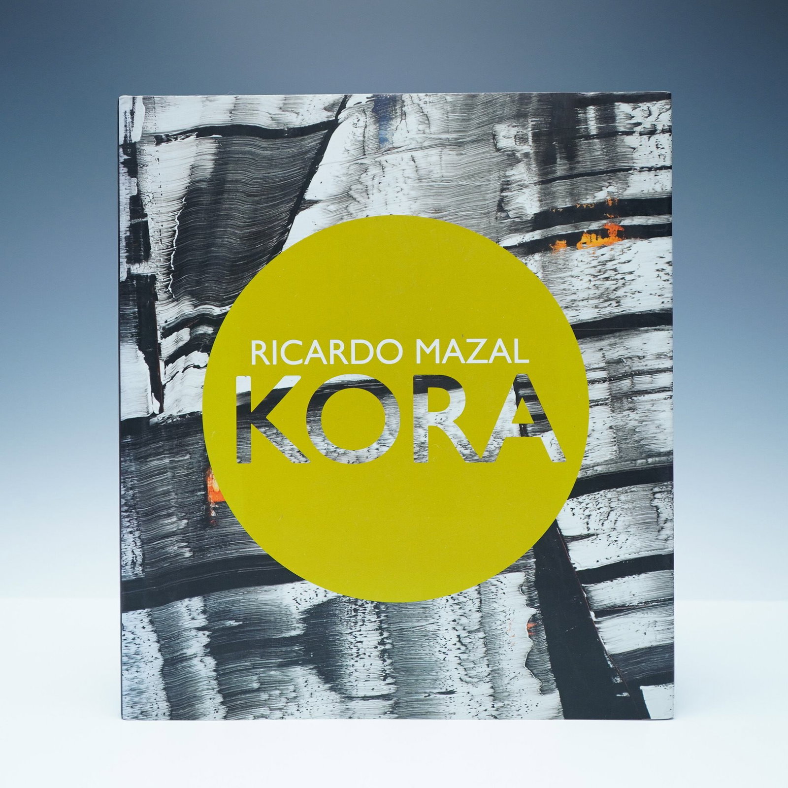 Ricardo Mazal Hardcover Book, Kora: New York: Sundaram Tagore Gallery, 2010. A monograph featuring the works of contemporary artist Ricardo Mazal, exploring his abstract interpretations of landscapes and cultural themes. Published in