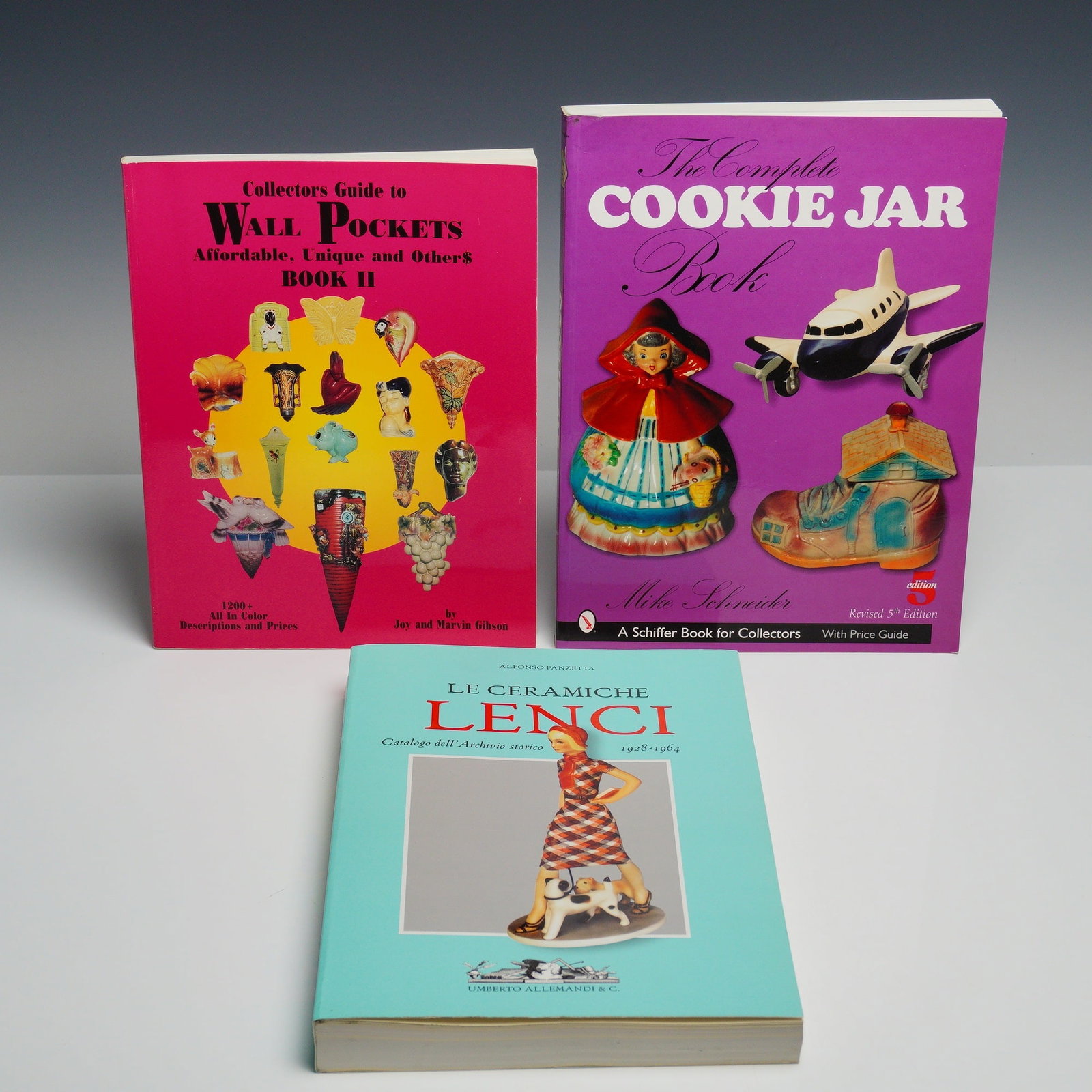 Three Collectible Ceramics Softcover Reference Books 1997-2005: This lot consists of three collectible ceramics books, featuring a mix of hardcover and trade paperbacks books. The collection includes the Collectors Guide to Wall Pockets: Affordable, Unique and