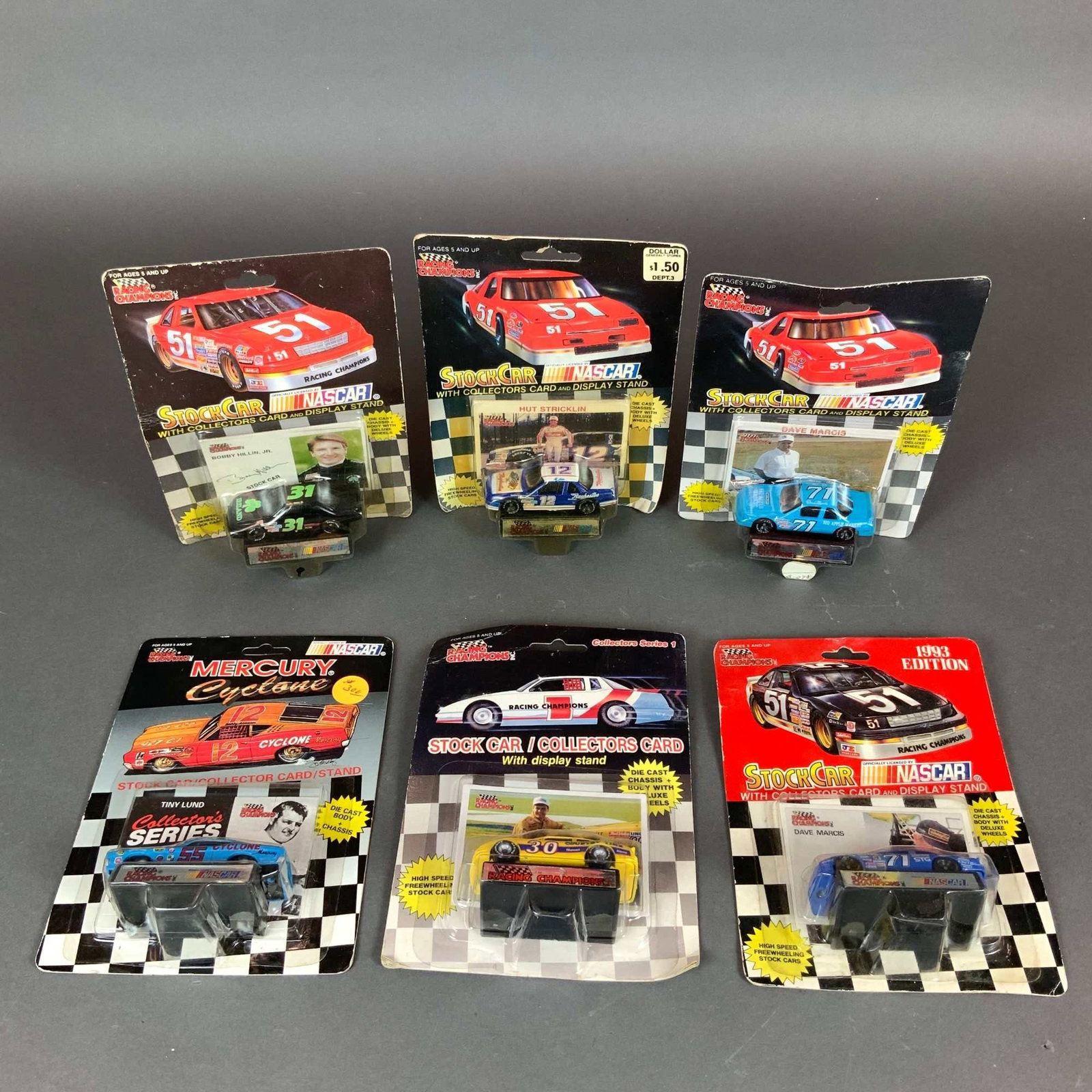 Six Racing Champions NASCAR StockCar Collectible Car Models: A collection of six vintage Racing Champions NASCAR die-cast stock cars, each contained within its original factory blister packaging. Produced in the late 1980s and early 1990s, these 1:64 scale mode