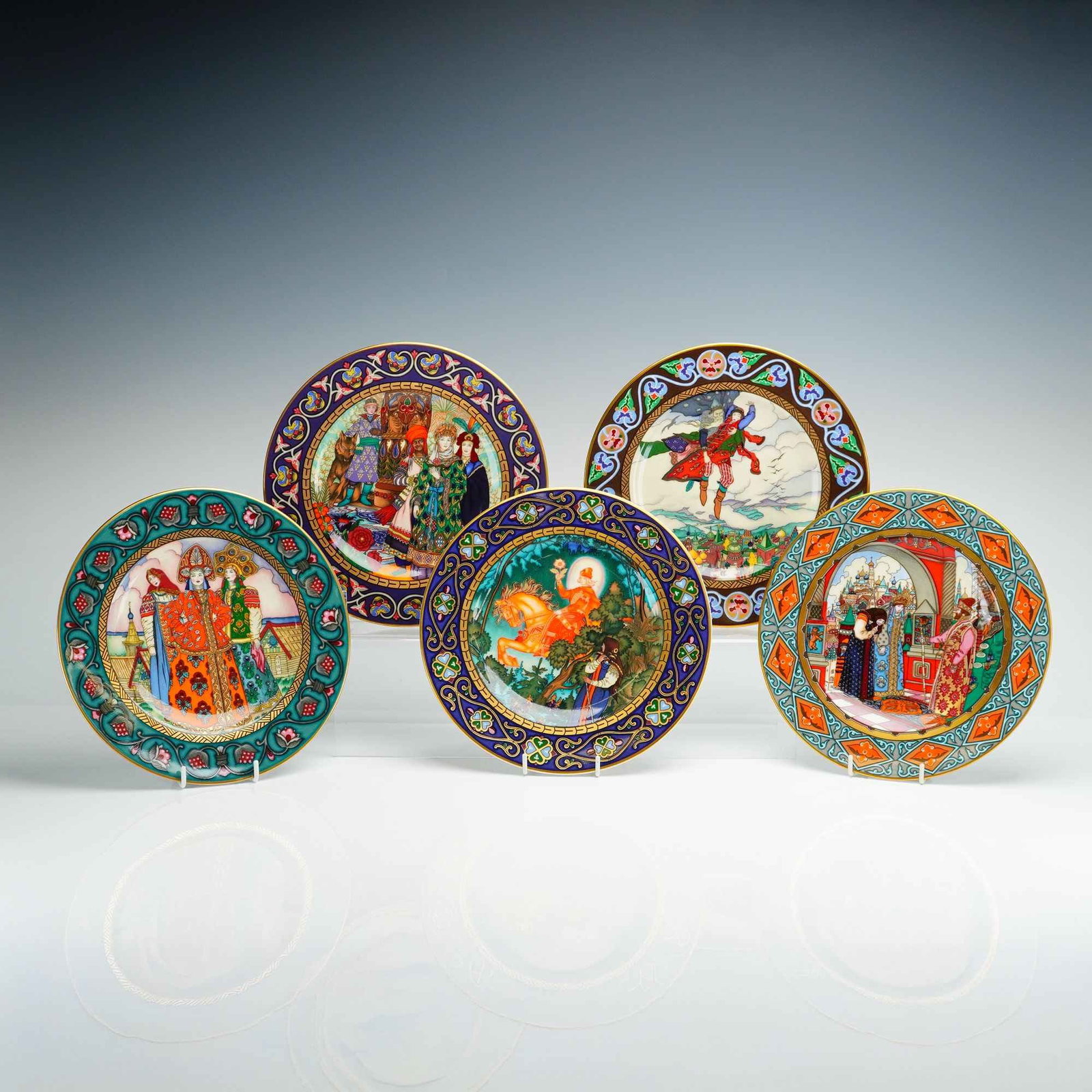 A Lot of 5 Heinrich Villeroy & Boch Russian Fairy Tale Porcelain Plates with Boxes and COA: A lot of 5 porcelain collector plates from the Russian Fairy Tales series, manufactured by Heinrich, a division of Villeroy & Boch, Germany. Each plate features intricate polychrome transfer-printed
