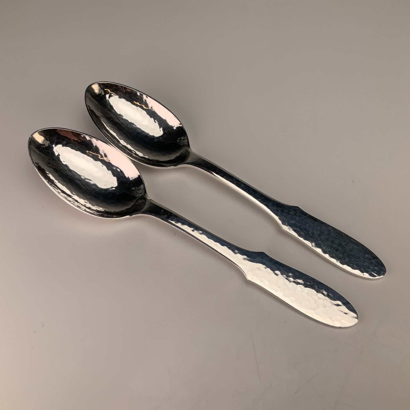 A Pair of Georg Jensen Denmark Mermaid Pattern Hammered Silverplate Teaspoons (1 of 3)