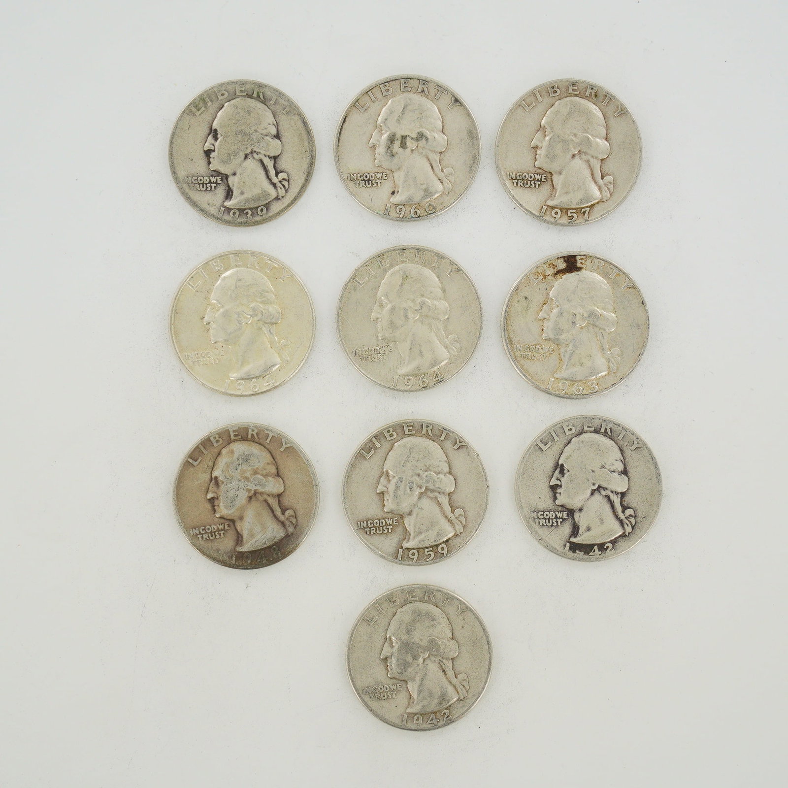 10pc Pre-1964 U.S. 90% Silver Washington Quarters: This mixed date bag of ten US Washington quarters is composed of 90% silver and 10% copper. The group includes specimens from the Philadelphia, Denver, and San Francisco mints. The specific dates and