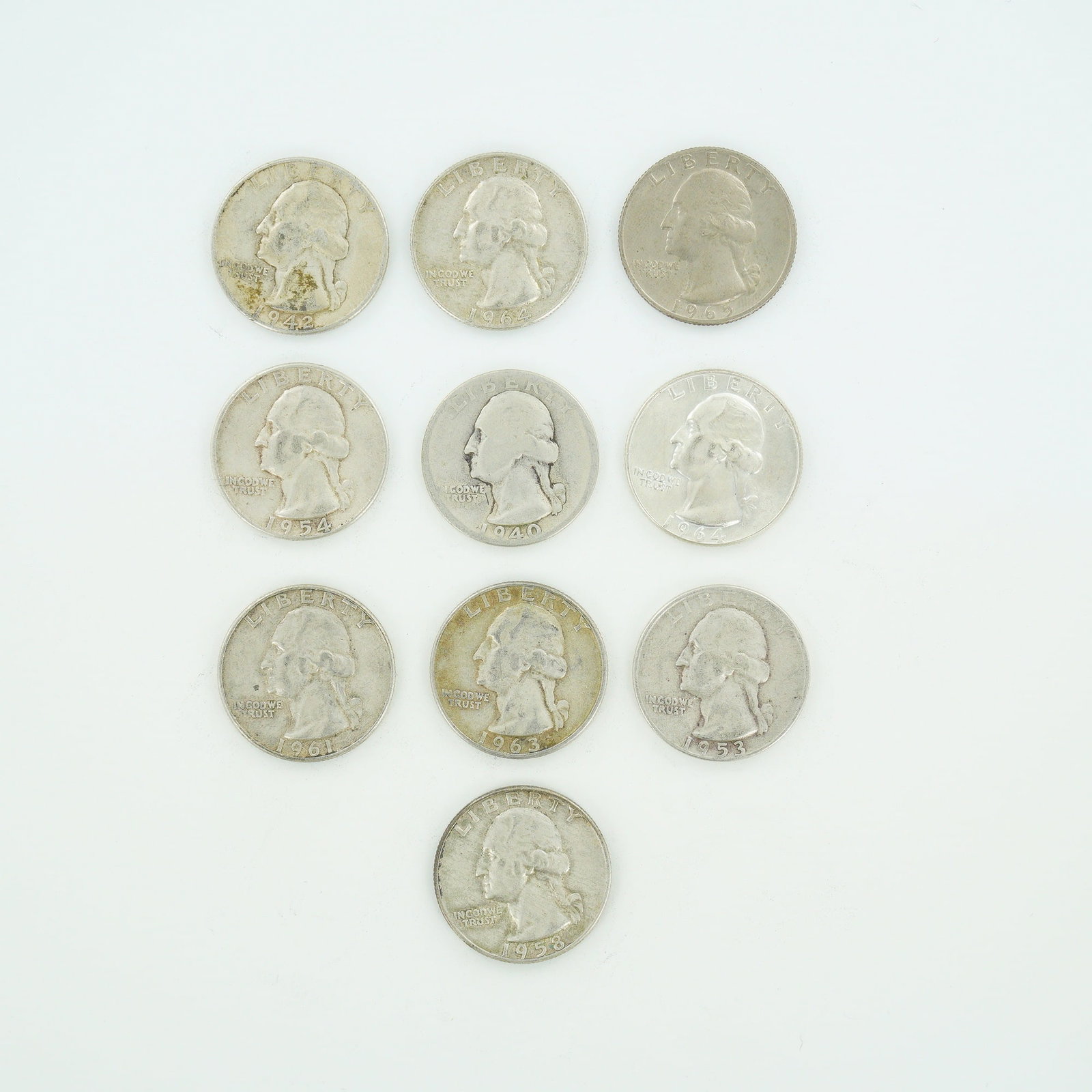 10pc Pre-1964 U.S. 90% Silver Washington Quarters: A collection of US Washington quarters struck in 90% silver (KM# 164). This mixed date bag of coinage includes issues from the Philadelphia, Denver, and San Francisco mints. Dates present include
