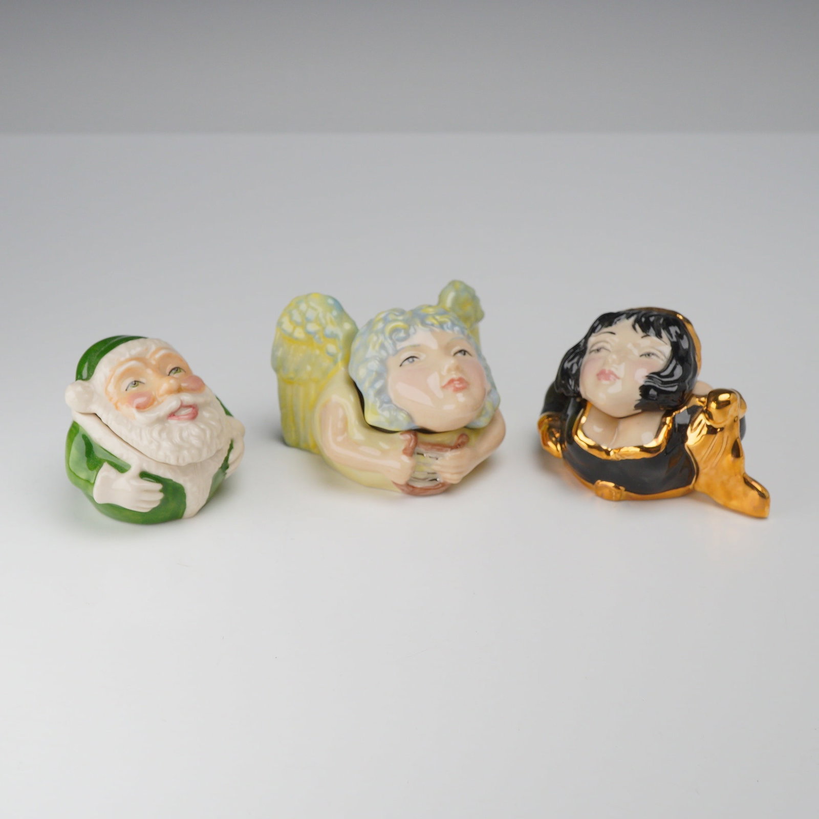3pc Kevin Francis Face Pots, Including Prototype: A collection of three hand-painted glazed ceramic lidded trinket boxes, known as Face Pots, produced by Kevin Francis. Each box features a character head as a lid and a coordinating torso as the base,