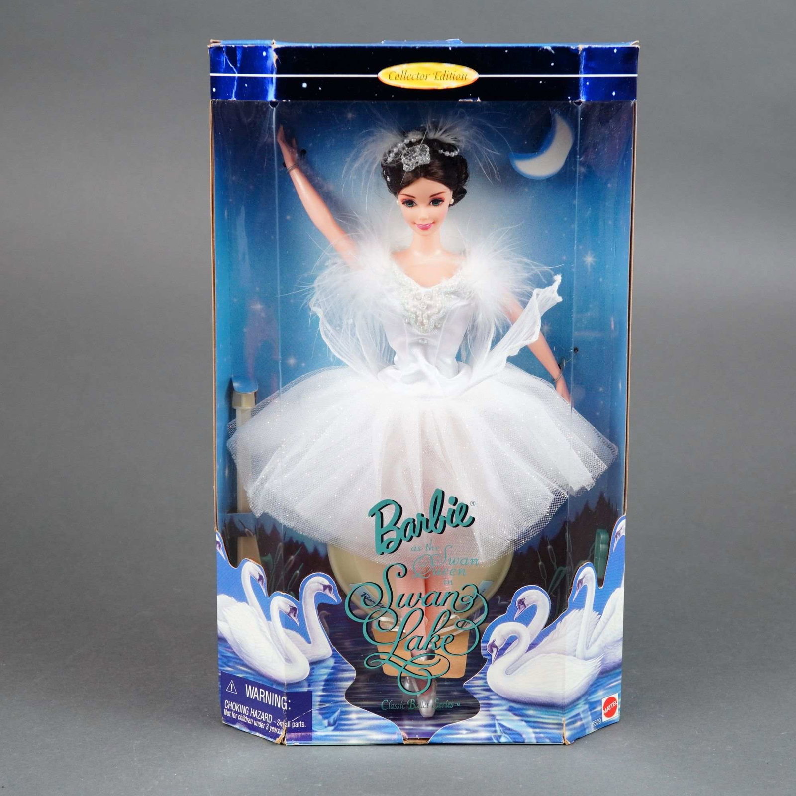 Mattel Barbie as the Swan Queen in Swan Lake Collector Edition, 11.5 Inches: Manufactured by Mattel, Inc. as part of the Classic Ballet Series, this Collector Edition vinyl doll features a jointed body and a detailed facial sculpt with fixed, painted blue eyes and rooted