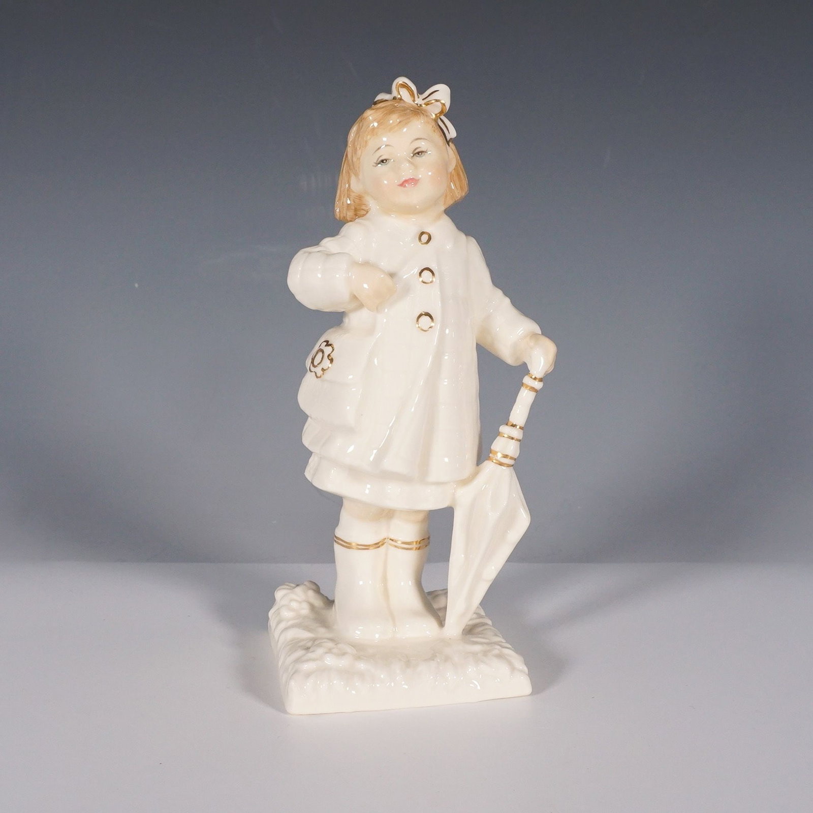 Royal Doulton Ivory and Gold Figurine, After The Rain HN4226 (1 of 6)
