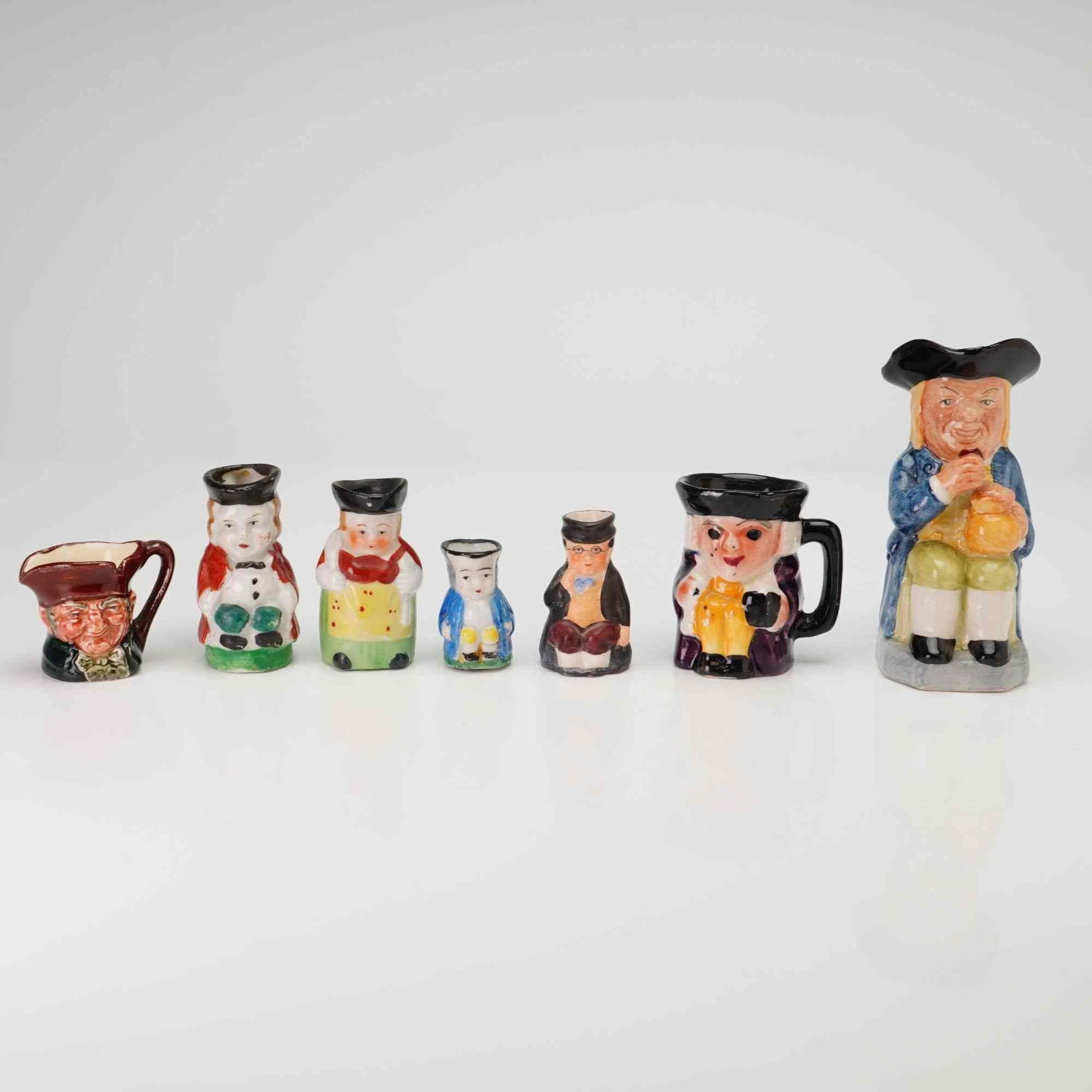 A Mixed Lot of 7 Miniature Character and Toby Jugs Including Royal Doulton and Kevin Francis (1 of 4)