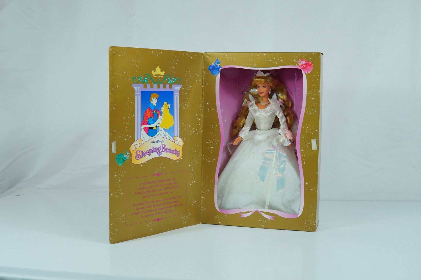 Mattel Walt Disney's Wedding Sleeping Beauty Barbie Doll, Second in a Series, 11.5 Inches: Produced by Mattel, this vinyl fashion doll represents Princess Aurora from Walt Disney's Sleeping Beauty in her wedding attire. This 1997 release is the second in a series of Disney wedding dolls. Th