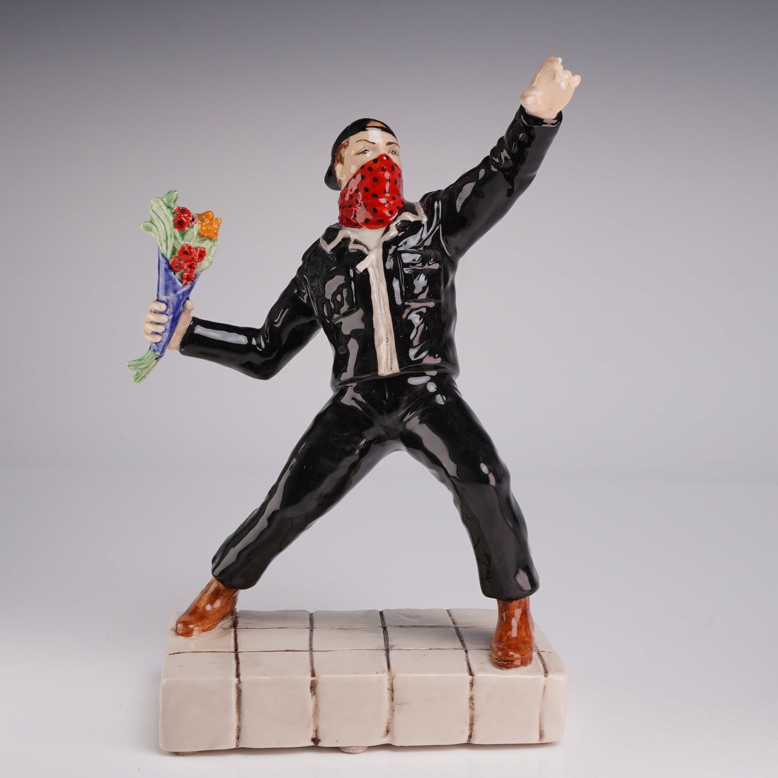 Kevin Francis Ceramics Street Art Banksy Flower Thrower Figurine Trial E by John Michael: This polychrome glazed ceramic figurine is a three-dimensional interpretation of the iconic Flower Thrower stencil art by the British street artist Banksy. Part of the Street Art series by Kevin