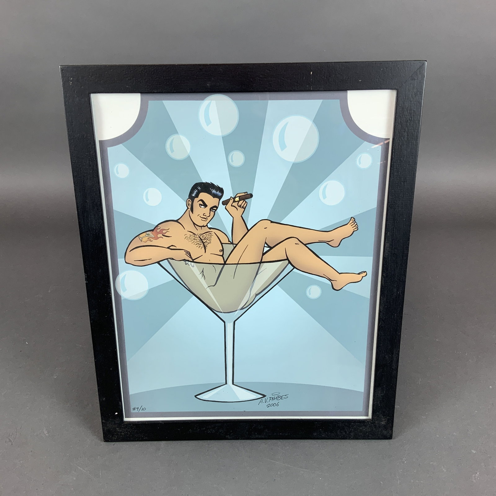 A.V. Phibes (American, 20th c), Cocktail, Digital Giclee Print, 2006: This digital giclee print, titled Cocktail, is by the artist A.V. Phibes. The work is a stylized, comic-book-inspired male pin-up illustration featuring a man with dark hair and a shoulder tattoo