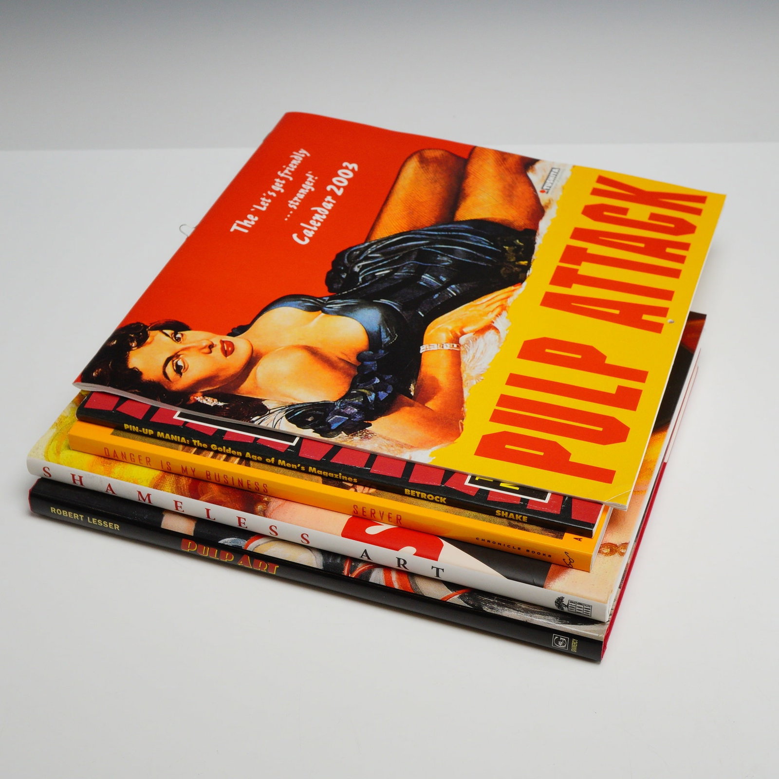 A Collection of Five Art Books and One Calendar on American Pulp and Western Art (1 of 5)