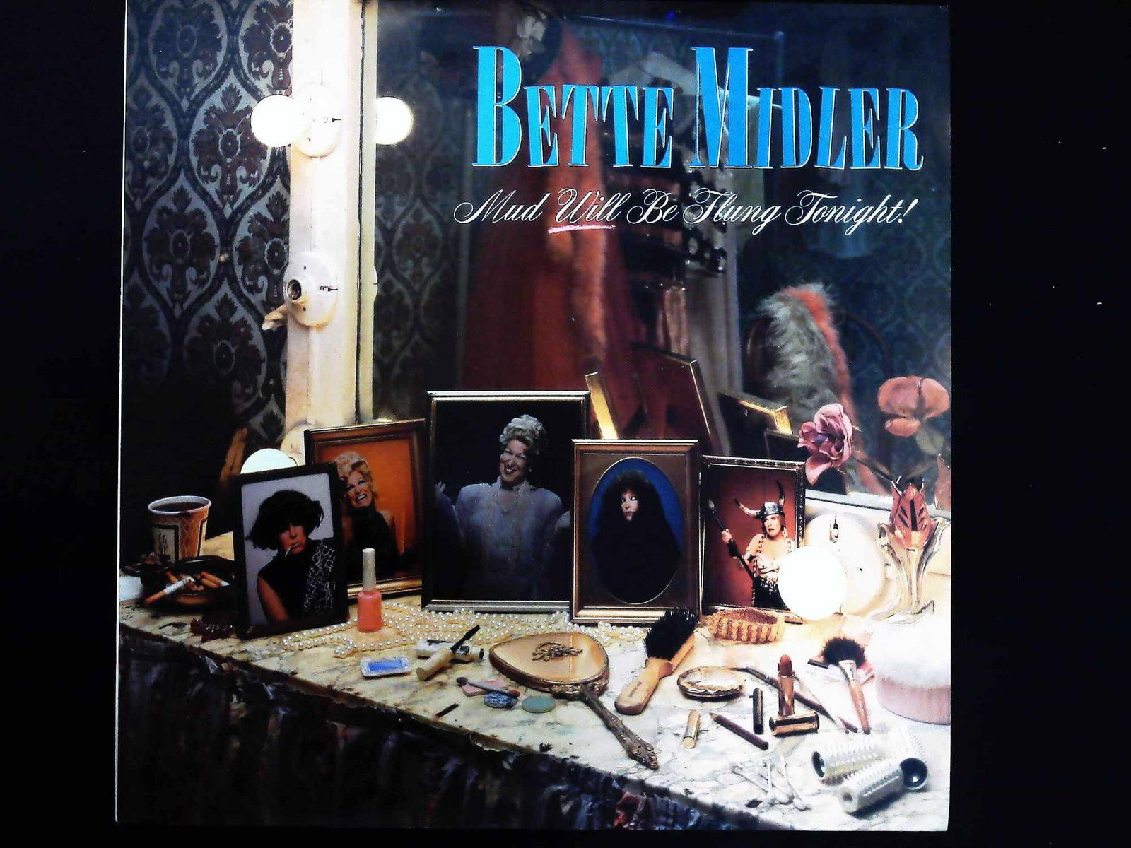 Bette Midler Mud Will Be Flung Tonight! 1987 Atlantic Records LP: A vintage 12-inch vinyl long-playing (LP) record featuring the 1987 comedy album by Bette Midler titled Mud Will Be Flung Tonight! The album was issued on the Atlantic Records label, bearing the catal