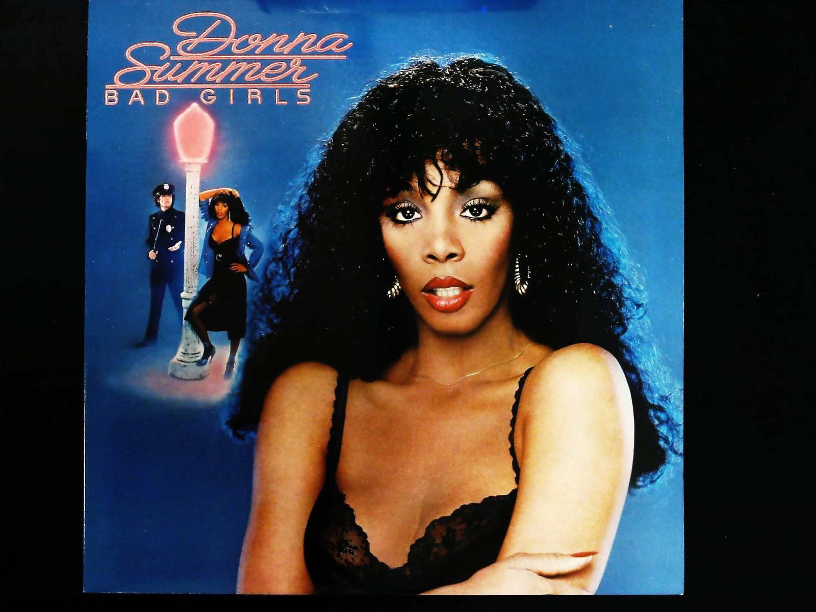 Donna Summer Bad Girls 1979 Double LP Record Album: A two-item lot comprising the vintage 1979 double Long Play (LP) record album Bad Girls by Donna Summer. The lot includes the black vinyl record disc and its original printed cardboard jacket. The alb