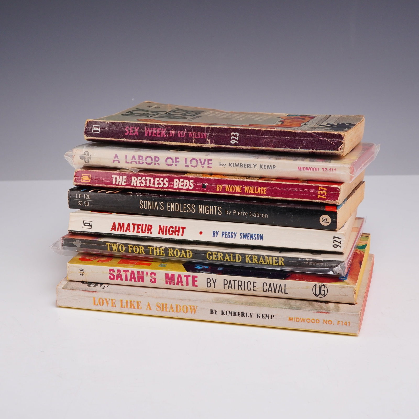 8pc Collection of Lesbian Pulp Fiction Paperbacks. Various Publishers, 1962-1969.: This 8-piece collection of vintage mass-market paperbacks features mid-century adult-oriented fiction, specifically focusing on the lesbian pulp and sleaze genres of the 1960s. The lot includes Sex We