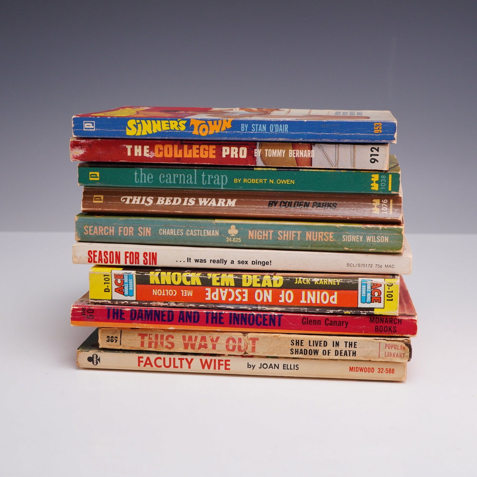 10pc Sleaze and Erotica Pulp Fiction Paperbacks. Various Publishers, c. 1950s-1960s.: This 10-piece collection of vintage mass-market paperbacks showcases a range of mid-century pulp fiction and exploitation titles defined by their provocative noir and erotica aesthetics. The assortmen