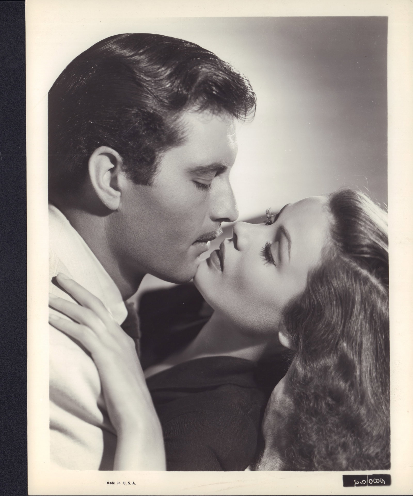 10pc Black and White Movie Star Promotional Photos from 1941-1942: A collection of ten vintage silver gelatin prints serving as promotional movie stills for Paramount Pictures and United Artists productions from the early 1940s. The group features dramatic and romant