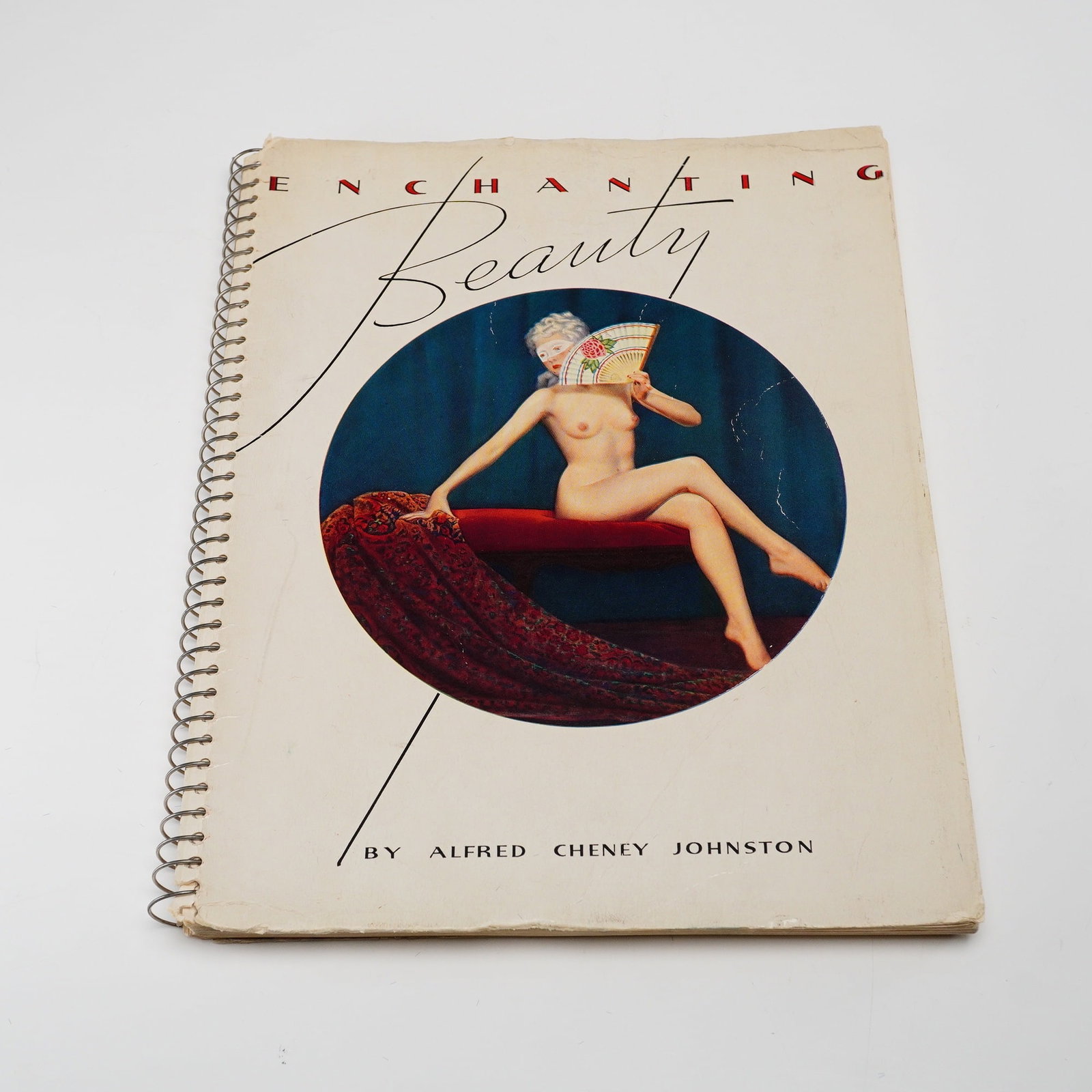 First Edition Johnston, Alfred Cheney. Enchanting Beauty, 1937: This first edition trade paperback book, titled Enchanting Beauty, features the photography of Alfred Cheney Johnston. Published in 1937 by Swan Publications, Inc., the volume is a large-format,