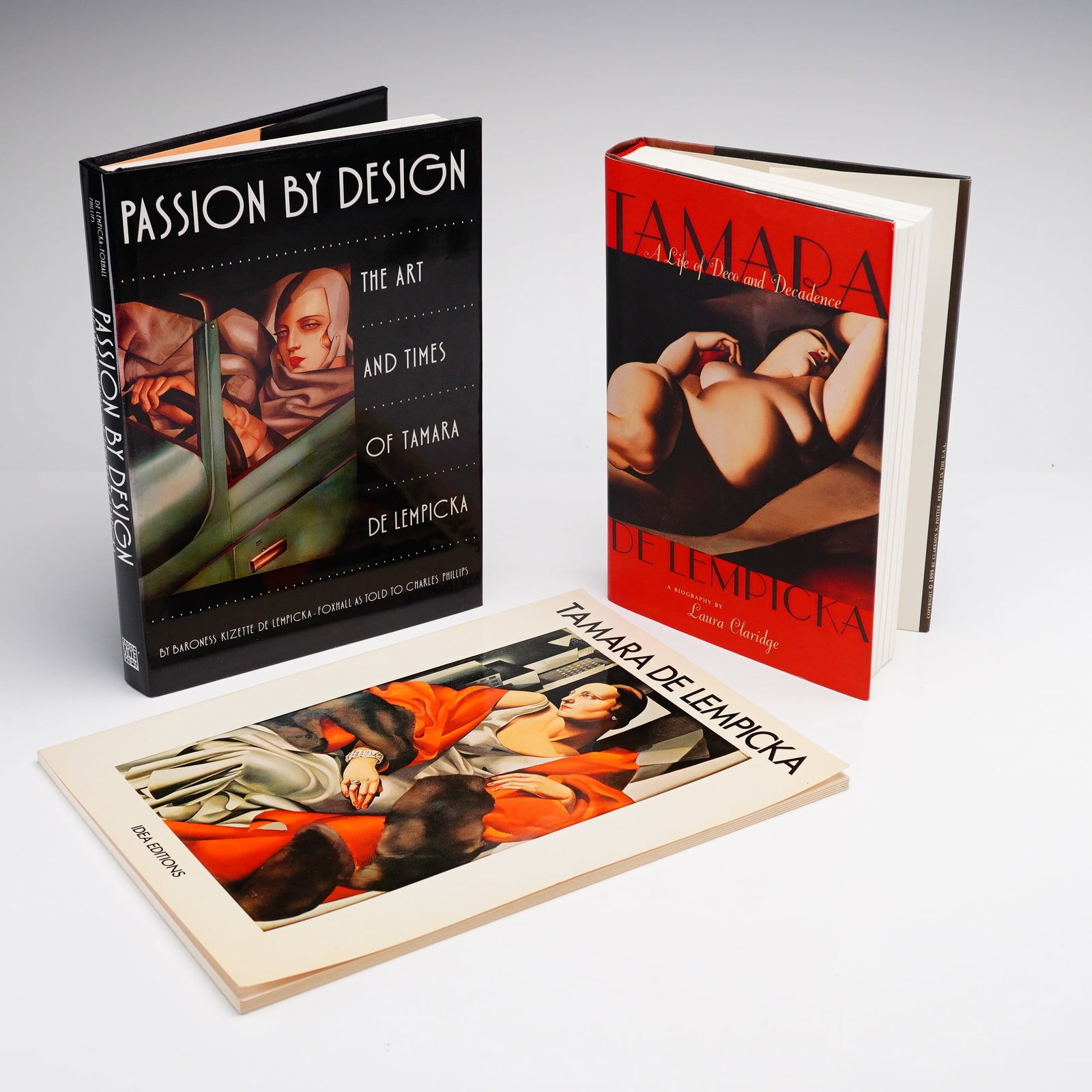 3pc Books on Tamara de Lempicka: A lot of three books documenting the life and Art Deco style of painter Tamara de Lempicka. Passion by Design: The Art and Times of Tamara de Lempicka by Baroness Kizette de Lempicka-Foxhall as told