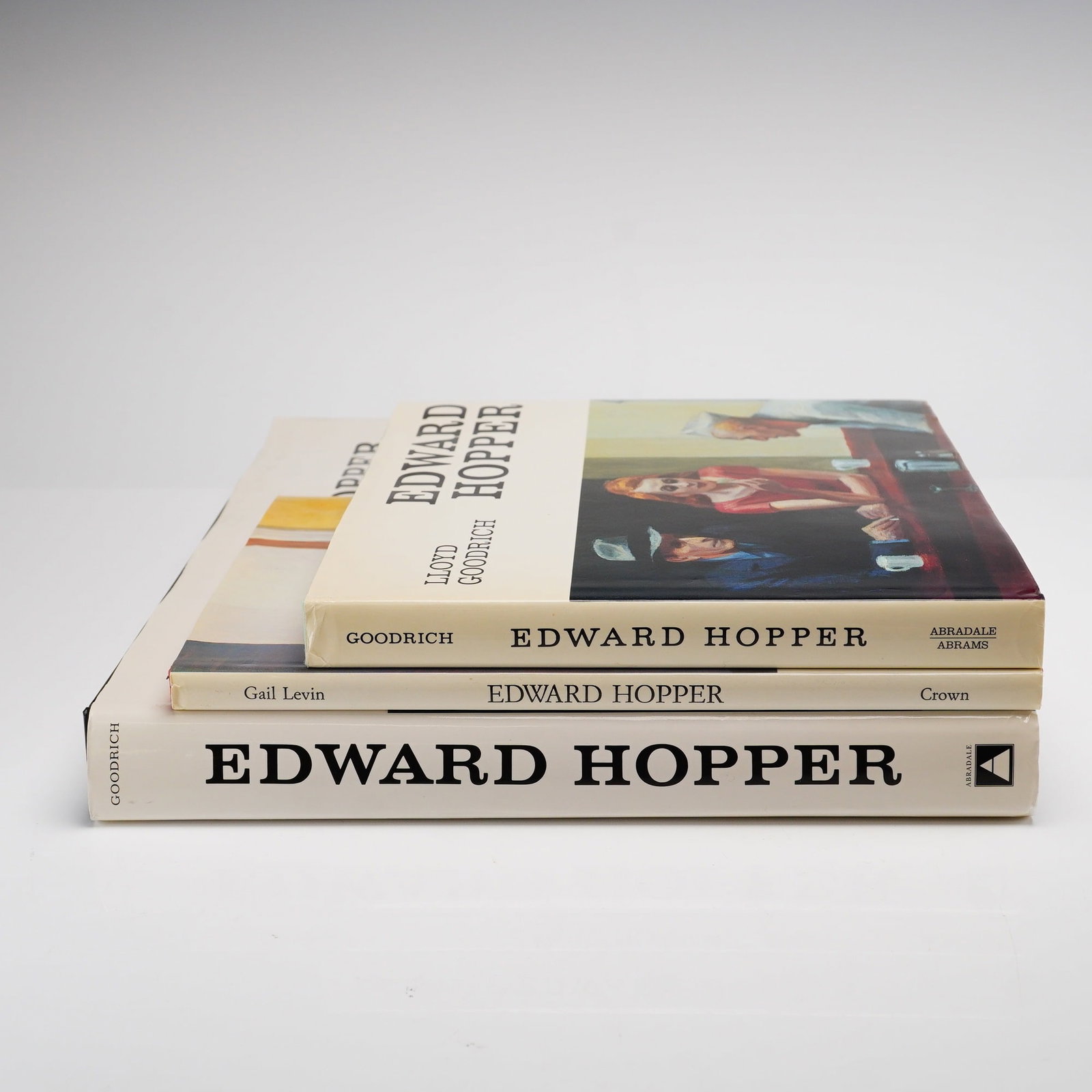 3pc Edward Hopper Hardcover Books: This lot of 3 Edward Hopper books by Lloyd Goodrich and Gail Levin consists of three large-format art monographs in cloth bindings with original dust jackets. The collection includes a folio-sized