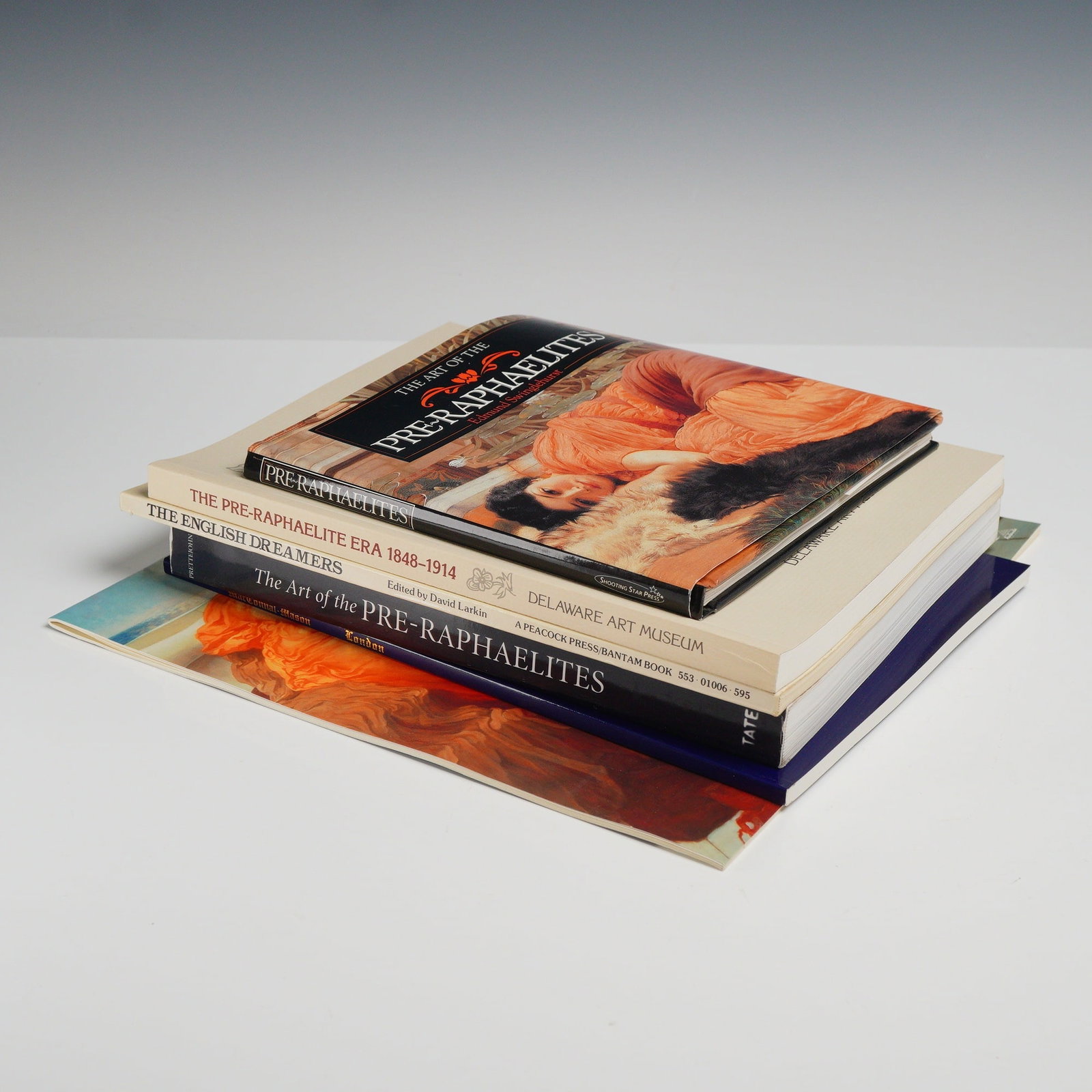 6pc Collection of New York City Art Books and Paperbacks: A 6-piece collection of hardcover and trade paperback books focusing on the art and cultural history of New York City. The primary volume is City as Canvas: New York City Graffiti / The Martin Wong Co
