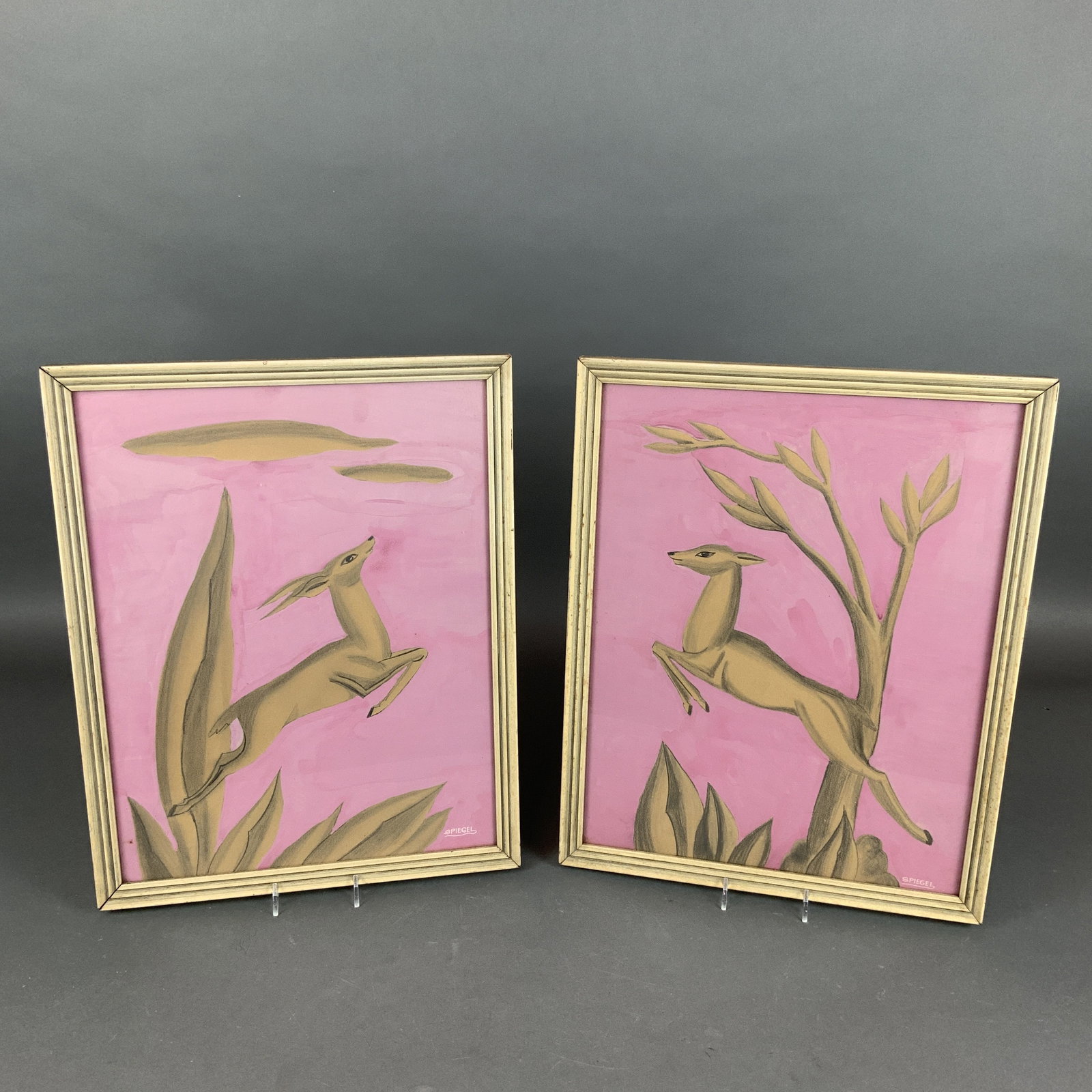 Spiegel, Pair of Mid-Century Modern Watercolor and Gouache Paintings of Deer: This pair of original artworks is signed Spiegel in the lower right corner of each piece. The works are executed in a combination of watercolor and opaque gouache on textured heavy paper. The stylized