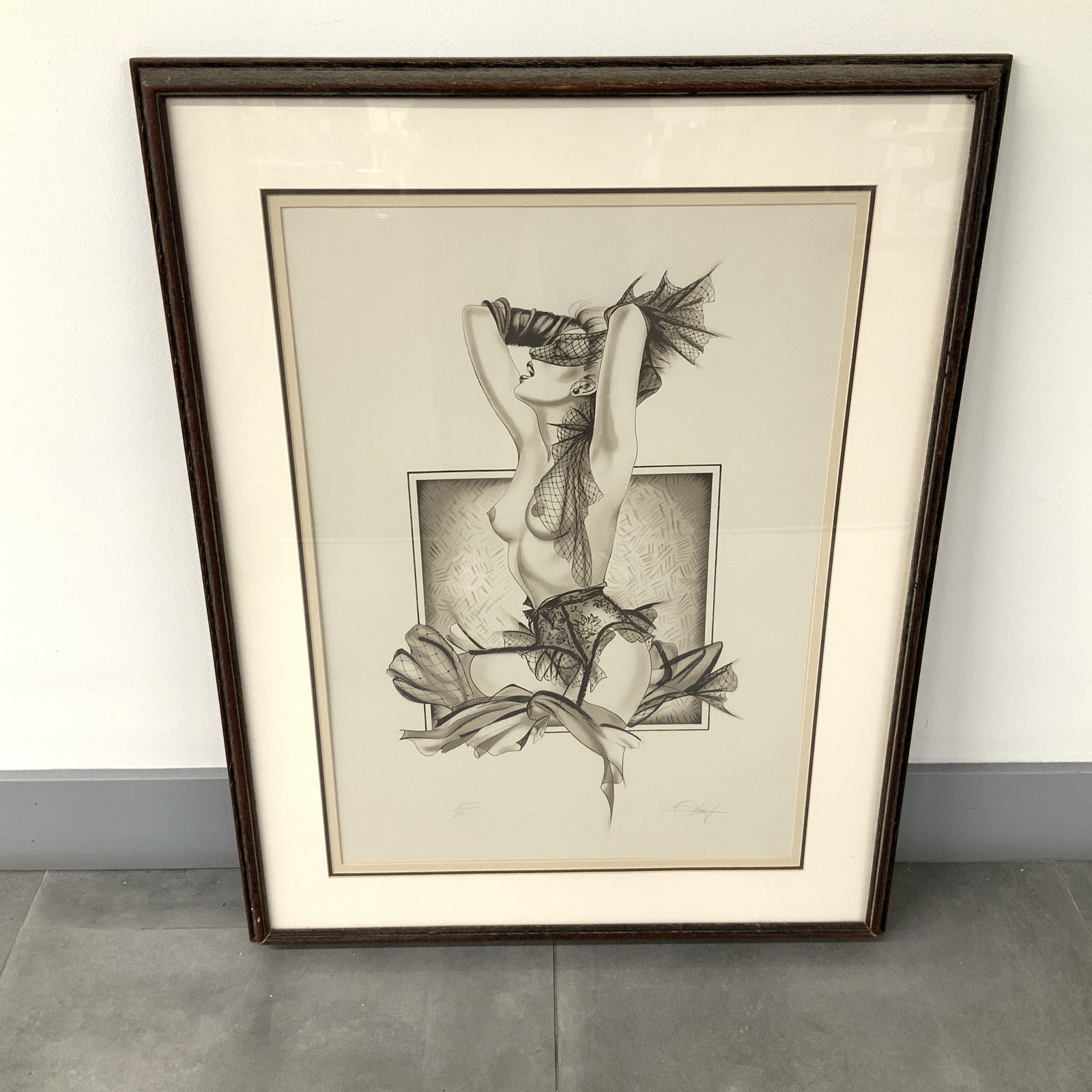 Olivia De Berardinis (American b. 1948) Lithograph on Paper, Erotic Nude, Signed & Numbered: An Olivia De Berardinis limited edition lithograph that features an erotic nude study. The reclining female figure wearing lace lingerie and a blindfold, positioned against a textured square backdrop.
