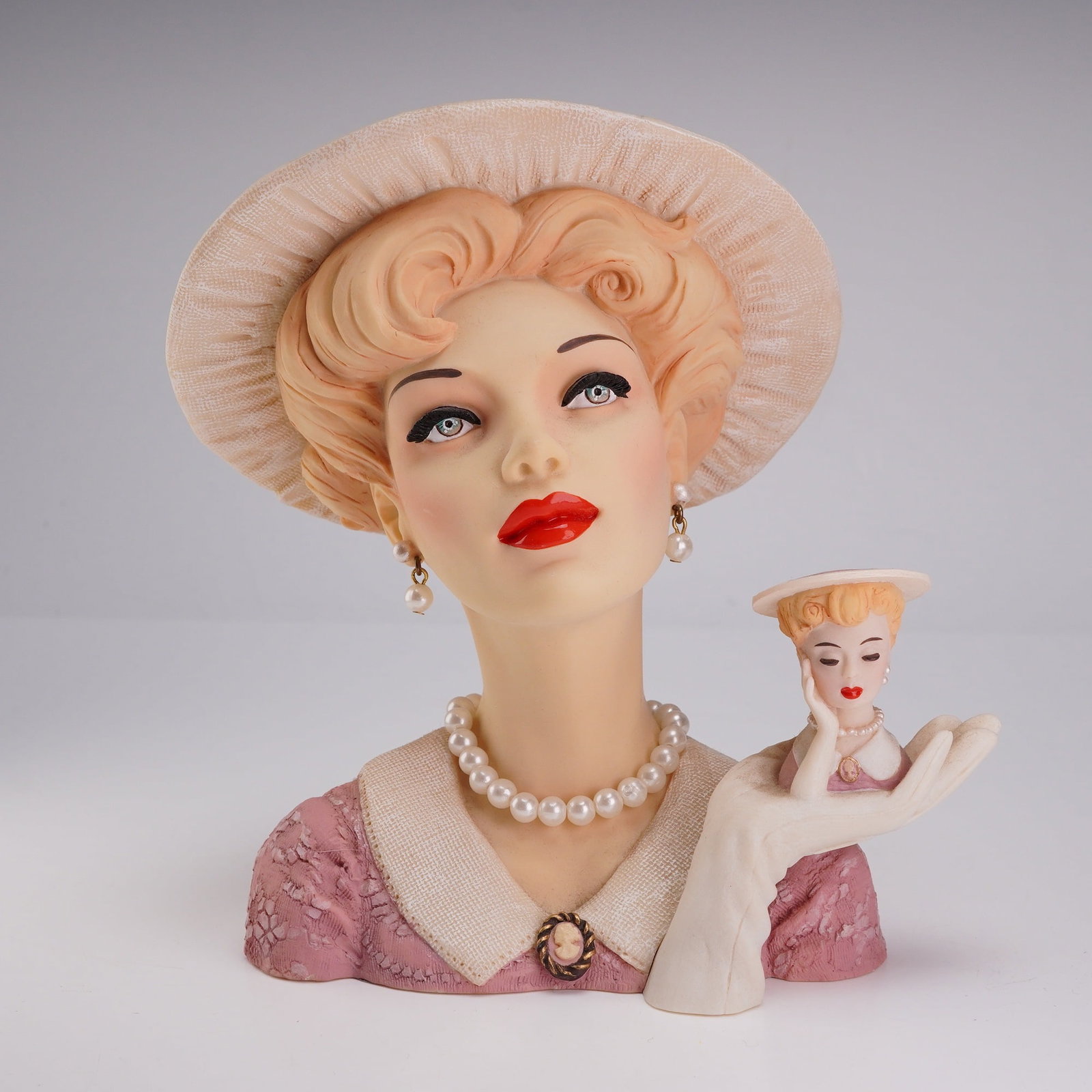 United Design Cameo Girls Abigail 1953 Heads Up Deluxe Lady Vase Limited Edition: A limited edition hand-painted cold-cast resin lady head vase from the Cameo Girls Deluxe Lady Vases collection produced by United Design Corporation. This piece, titled Abigail 1953 Heads Up, depicts
